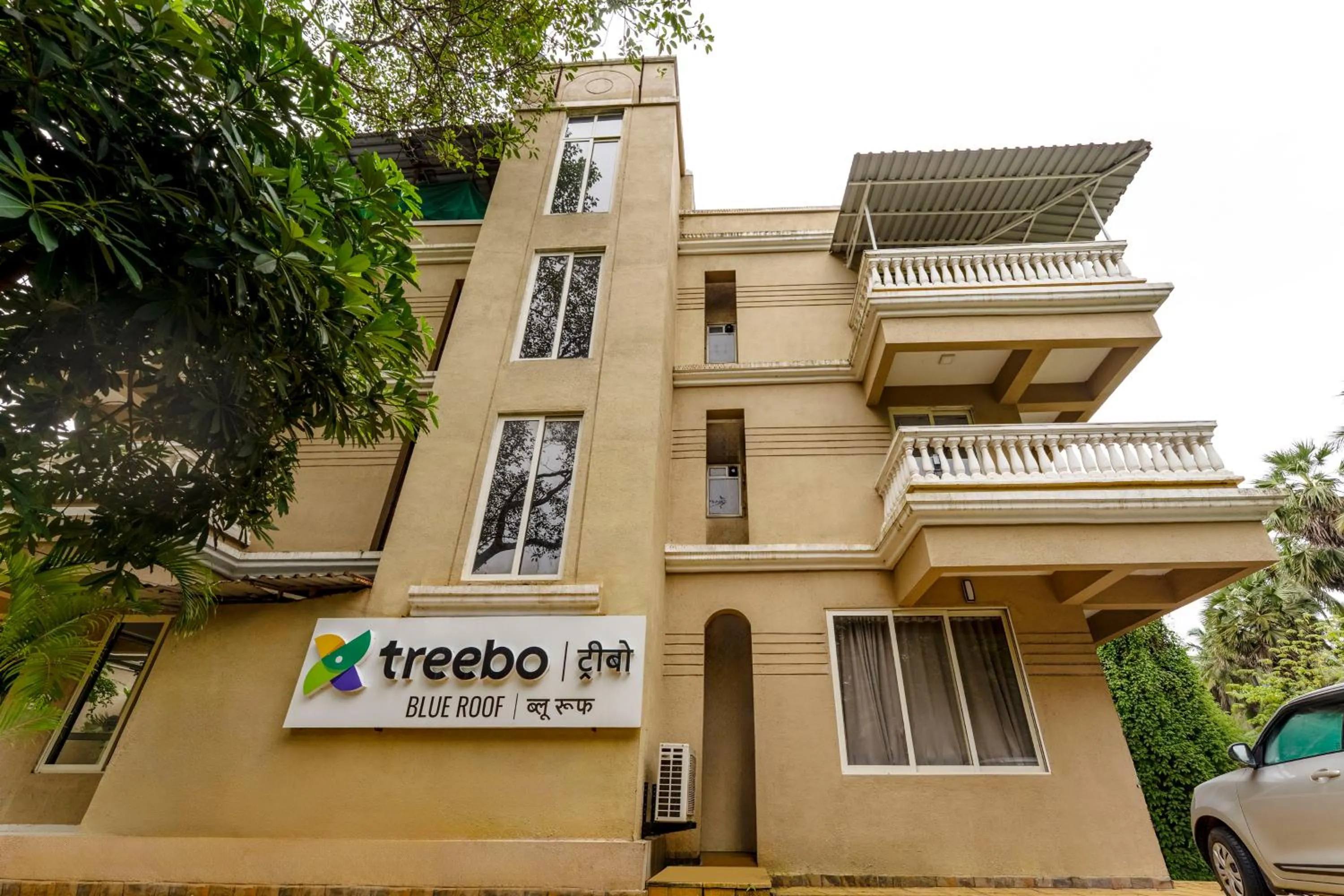 Property building in Treebo Blue Roof, Kelwa