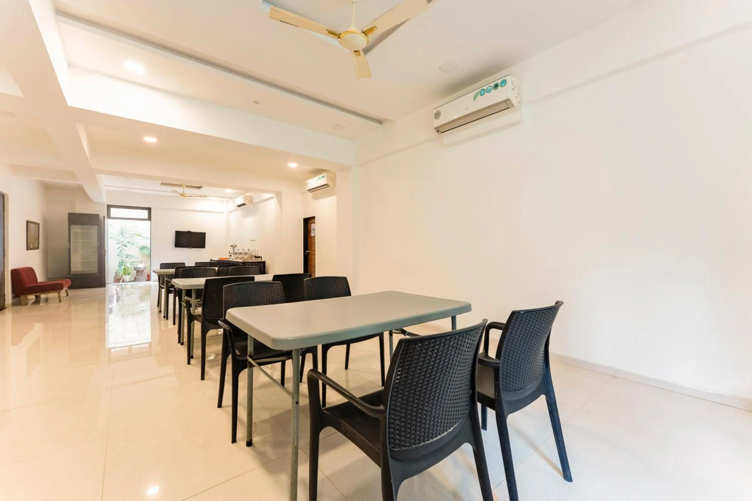 Dining area in Treebo Blue Roof, Kelwa