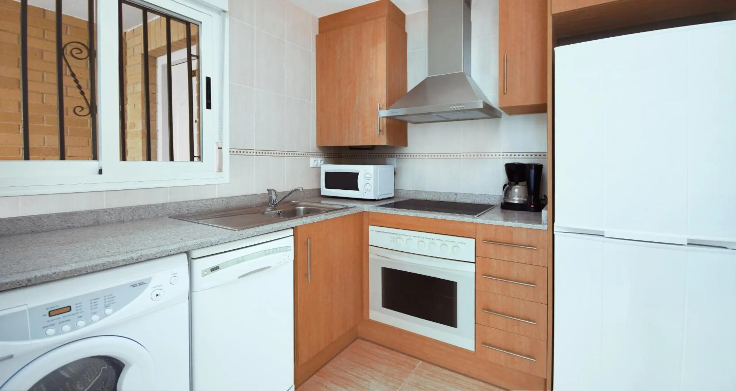 Kitchen or kitchenette in Vacaciones Oromarina Azahar