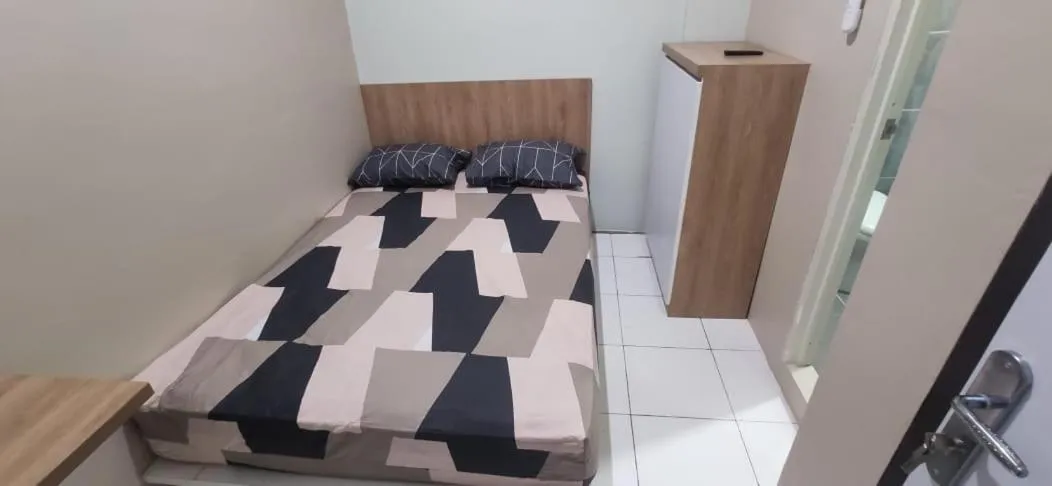 Bed in Behomy Cibinong Suite