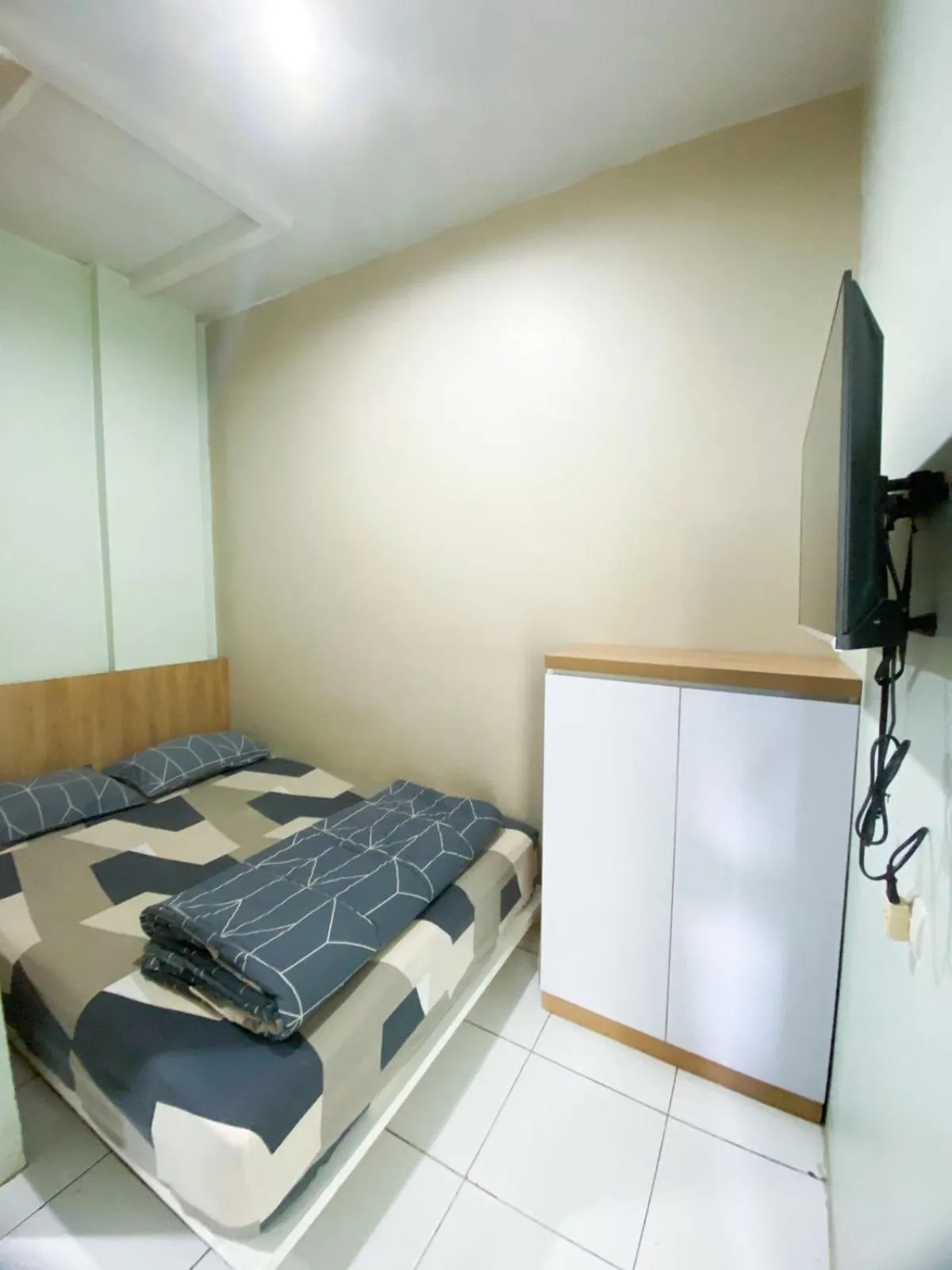 Bed in Behomy Cibinong Suite