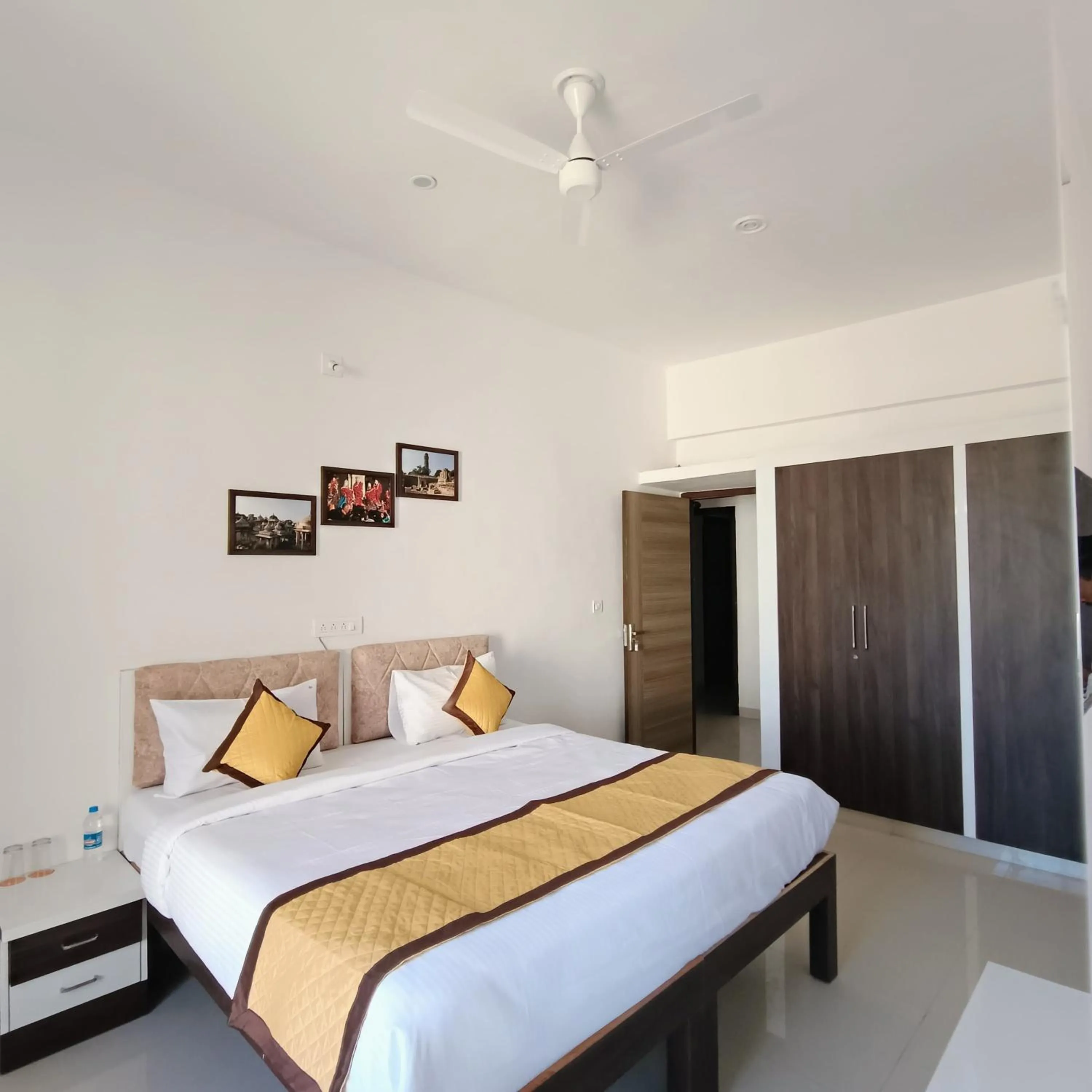 Bed in Arul's Hotel