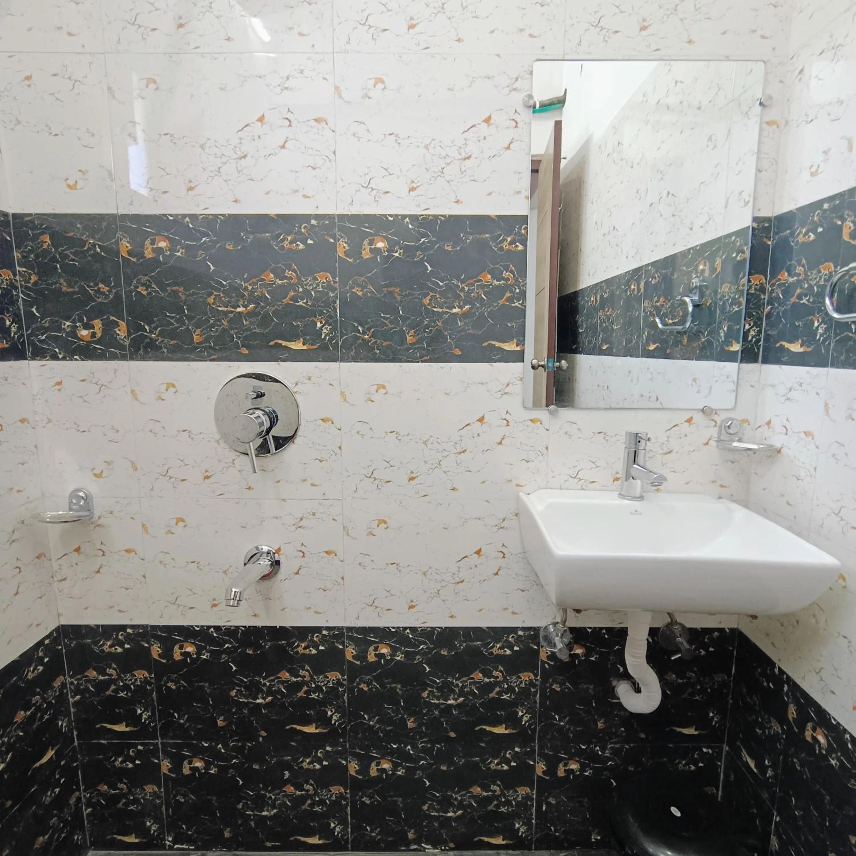 Bathroom in Arul's Hotel
