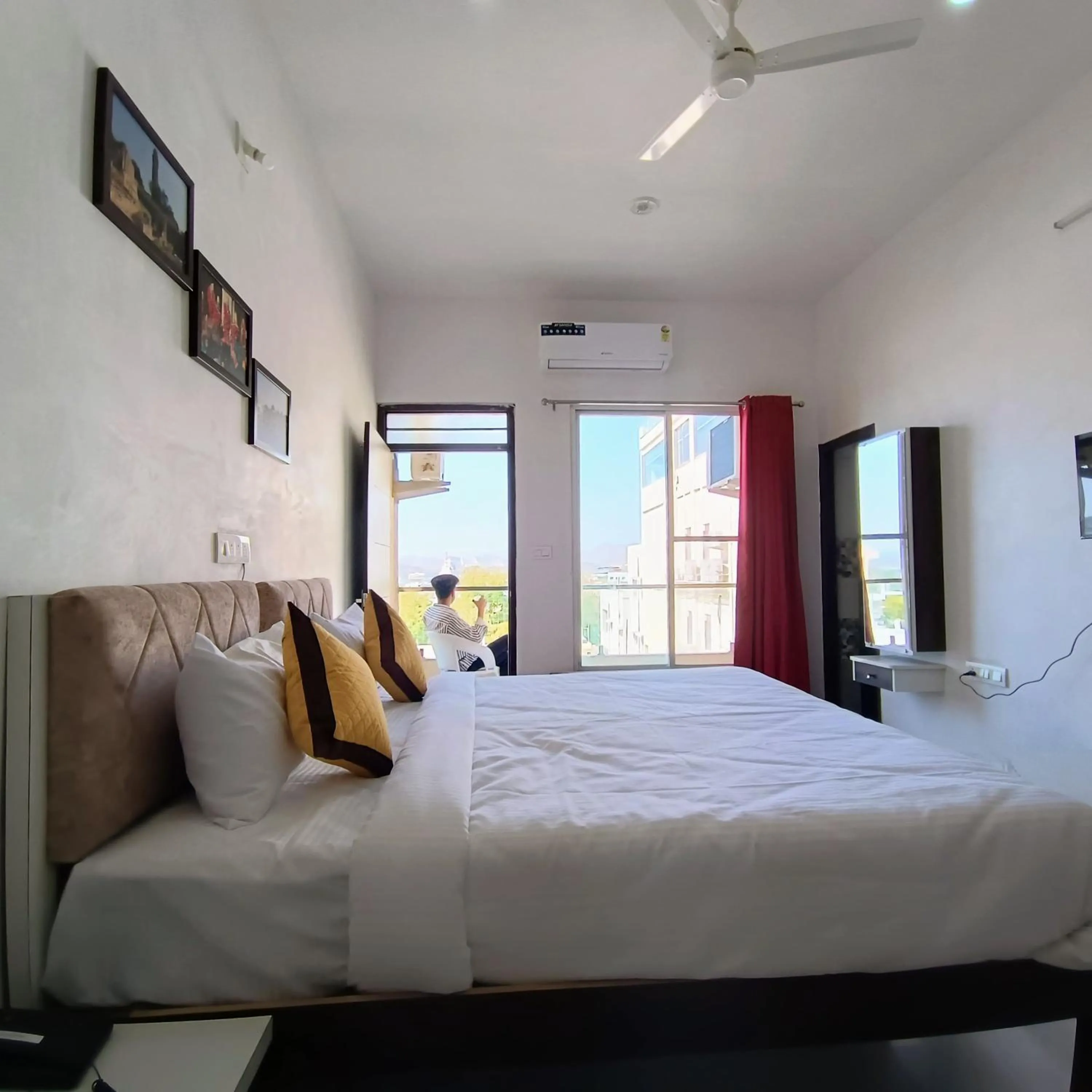 Bed in Arul's Hotel