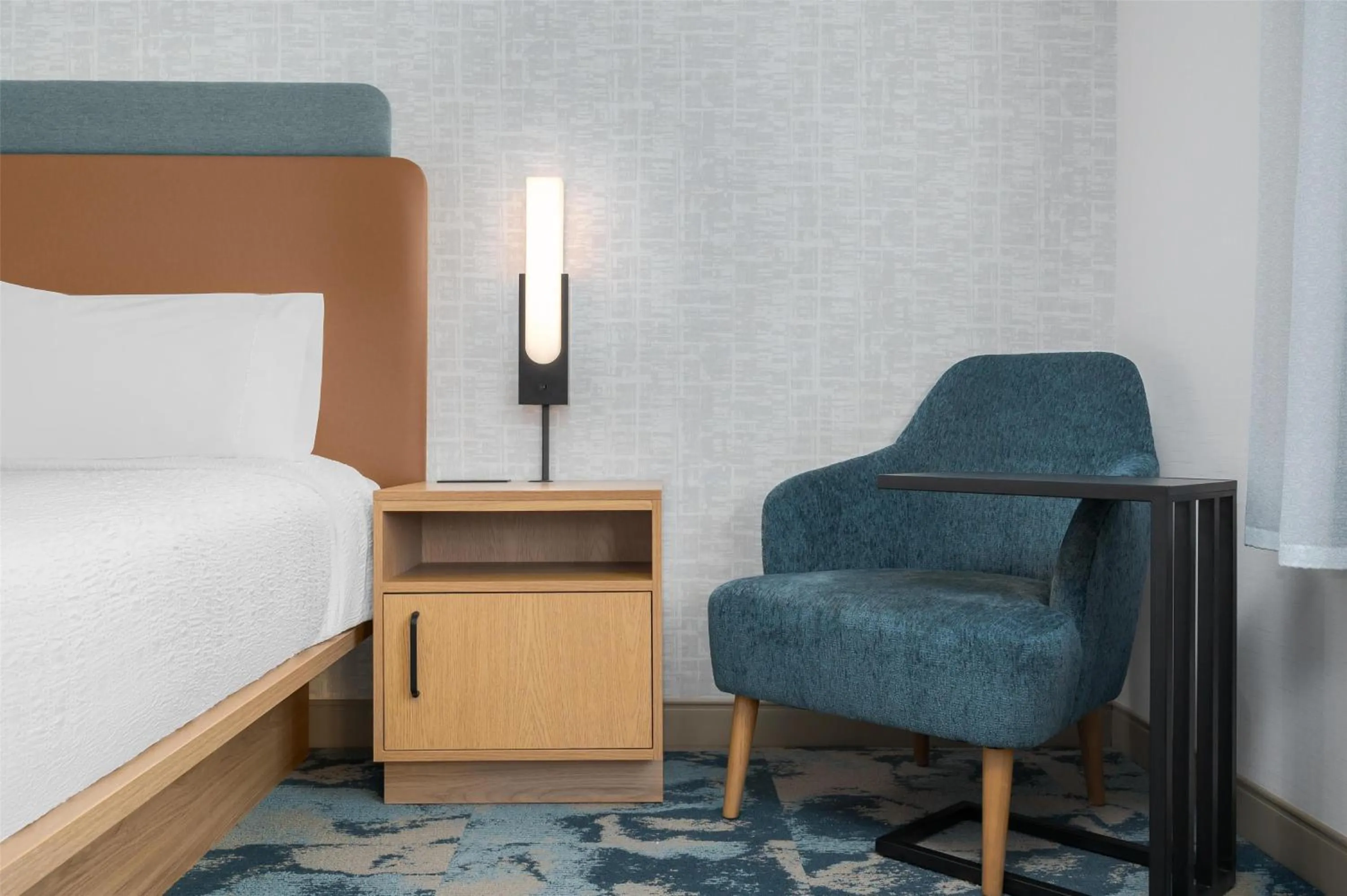 Bed in Hampton Inn & Suites Alpena