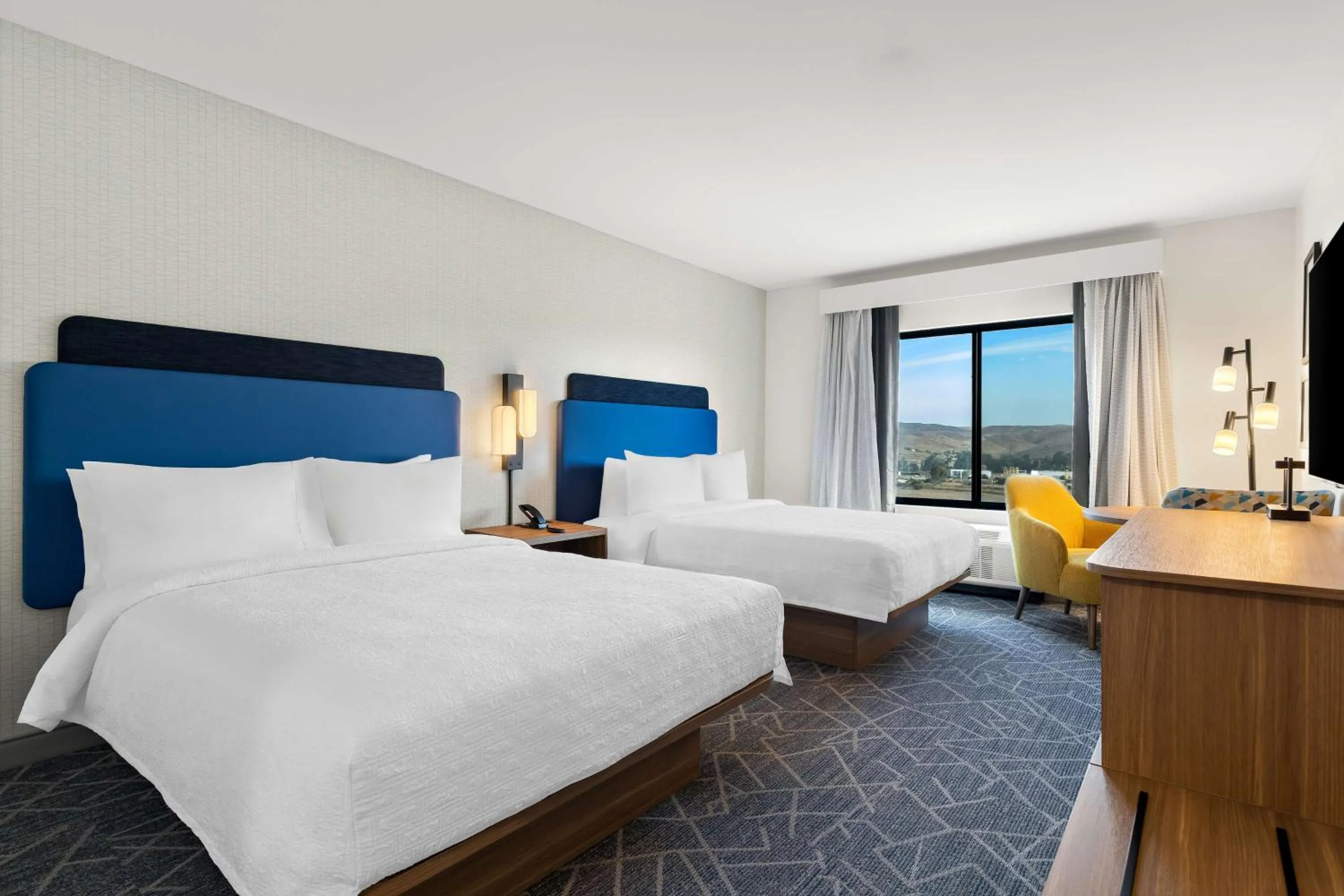 Bed in Hampton Inn & Suites Corona, Ca