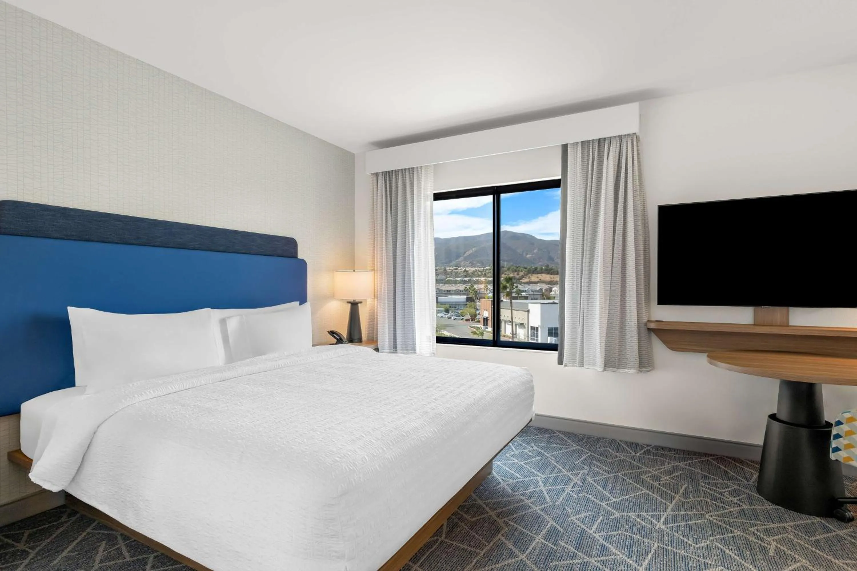 Bed in Hampton Inn & Suites Corona, Ca