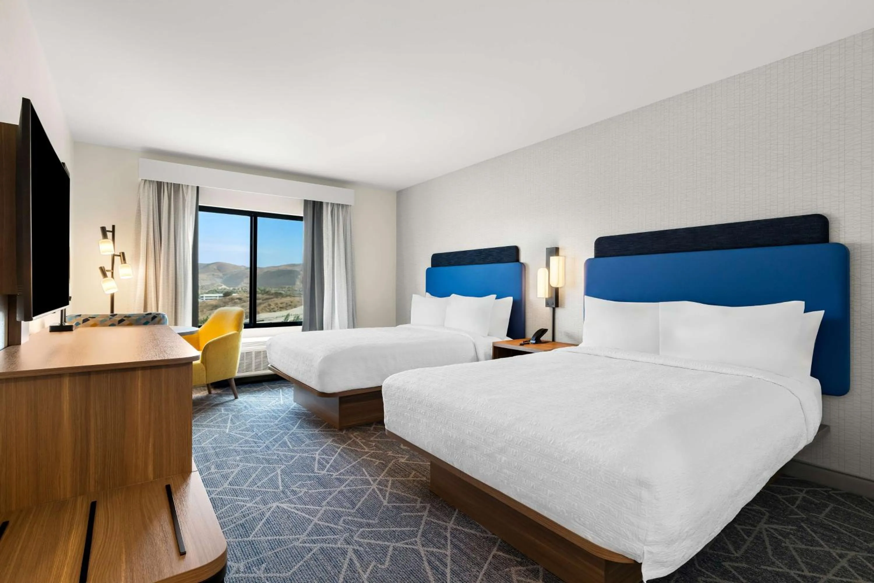 Bed in Hampton Inn & Suites Corona, Ca