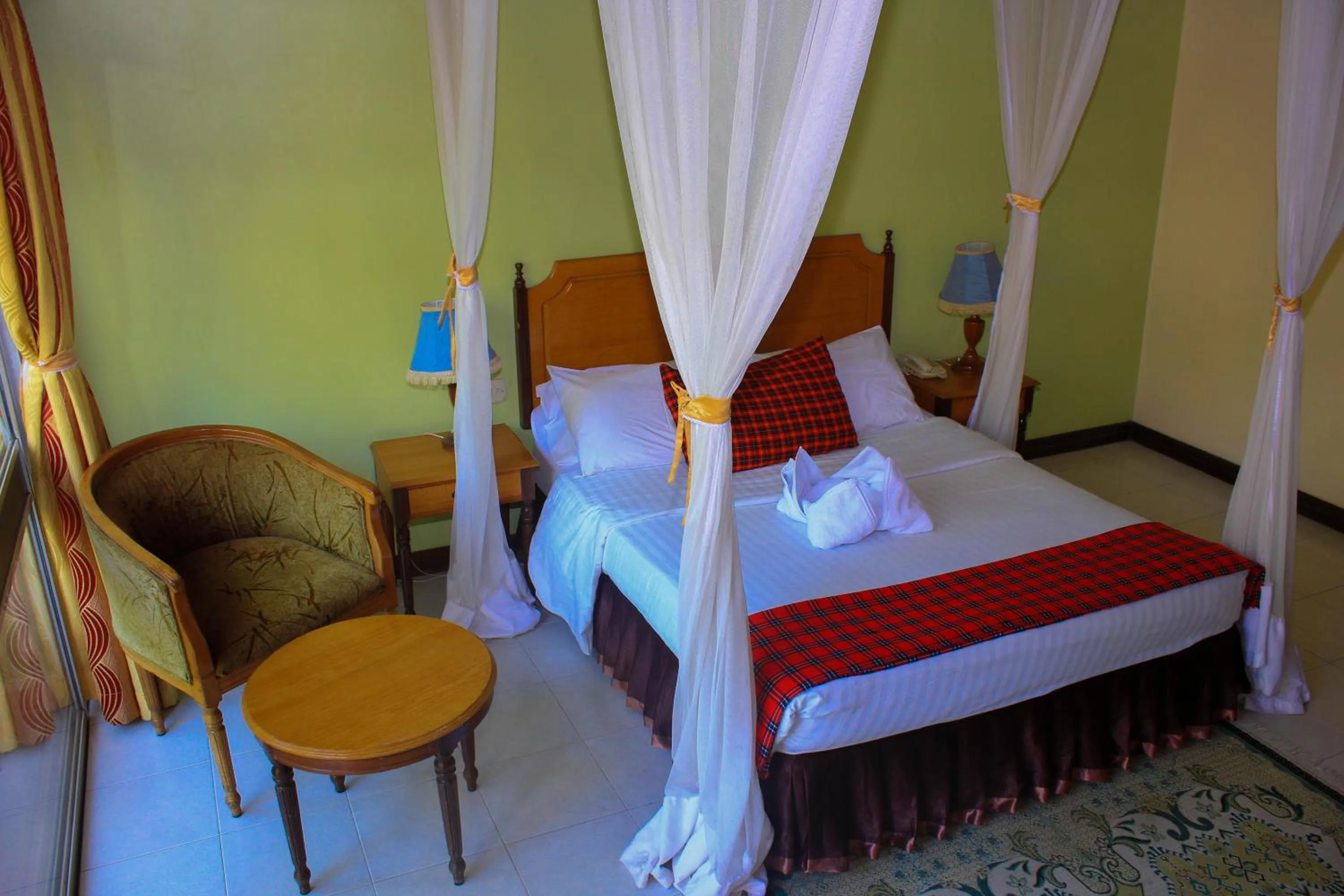 Photo of the whole room, Bed in Equator Hotel