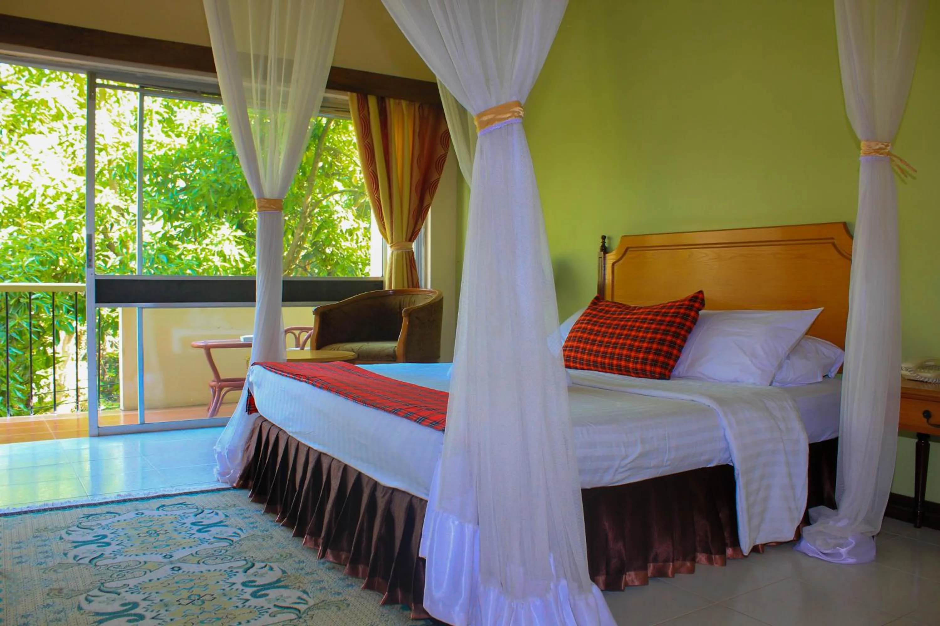 Photo of the whole room, Bed in Equator Hotel
