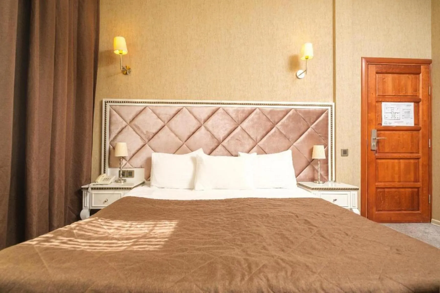 Bed in Maestro Hotel