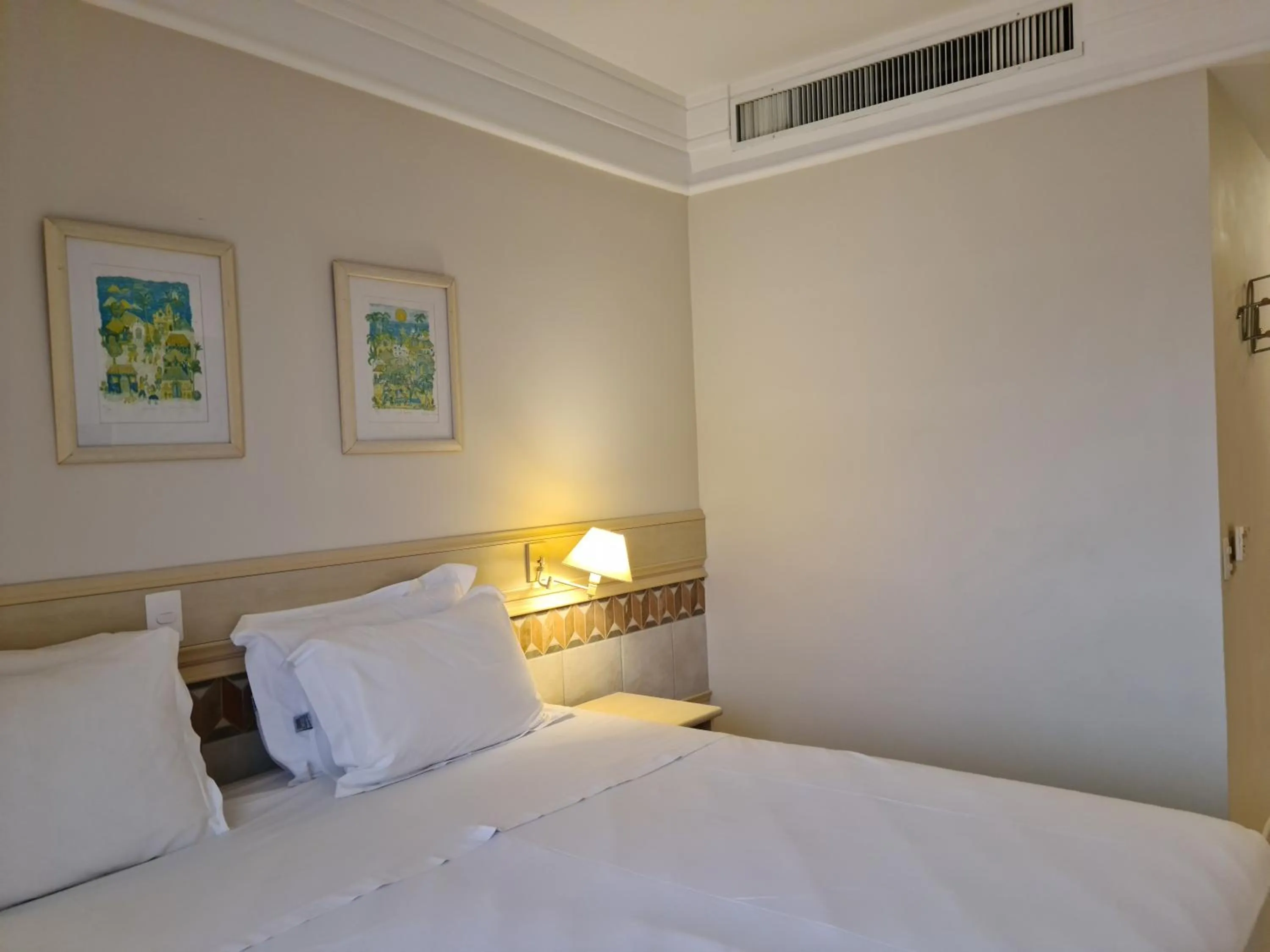 Bed in Jurerê Beach Village Studios Para Temporada