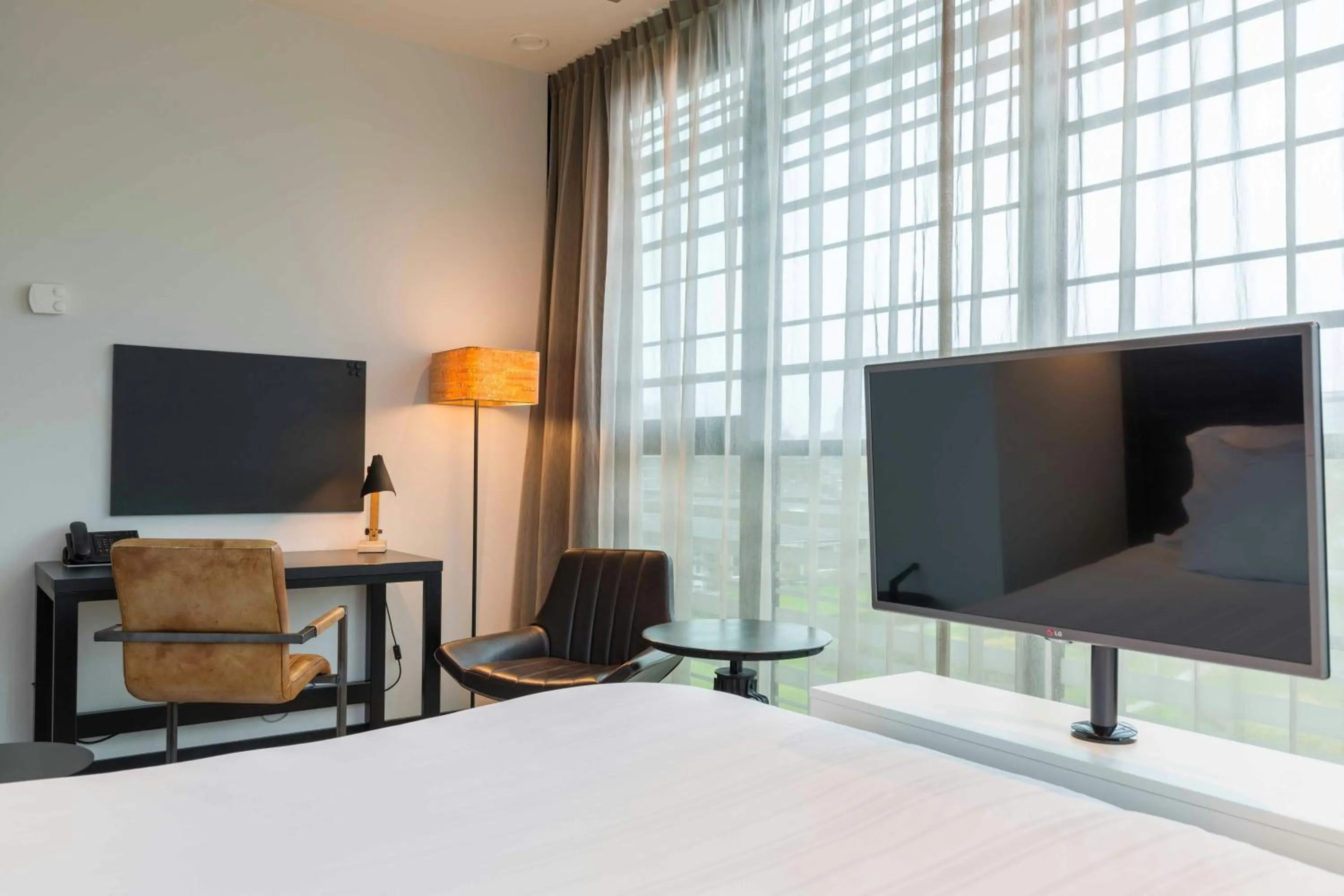 Photo of the whole room, Bed in Leonardo Hotel Groningen Stadspark