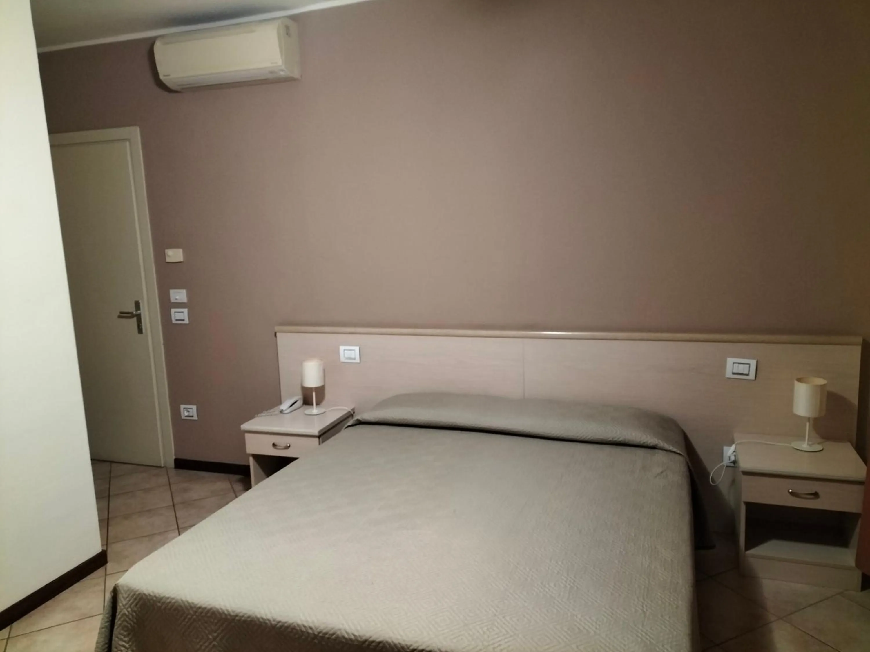 Bedroom in Albergo Grifone 1891