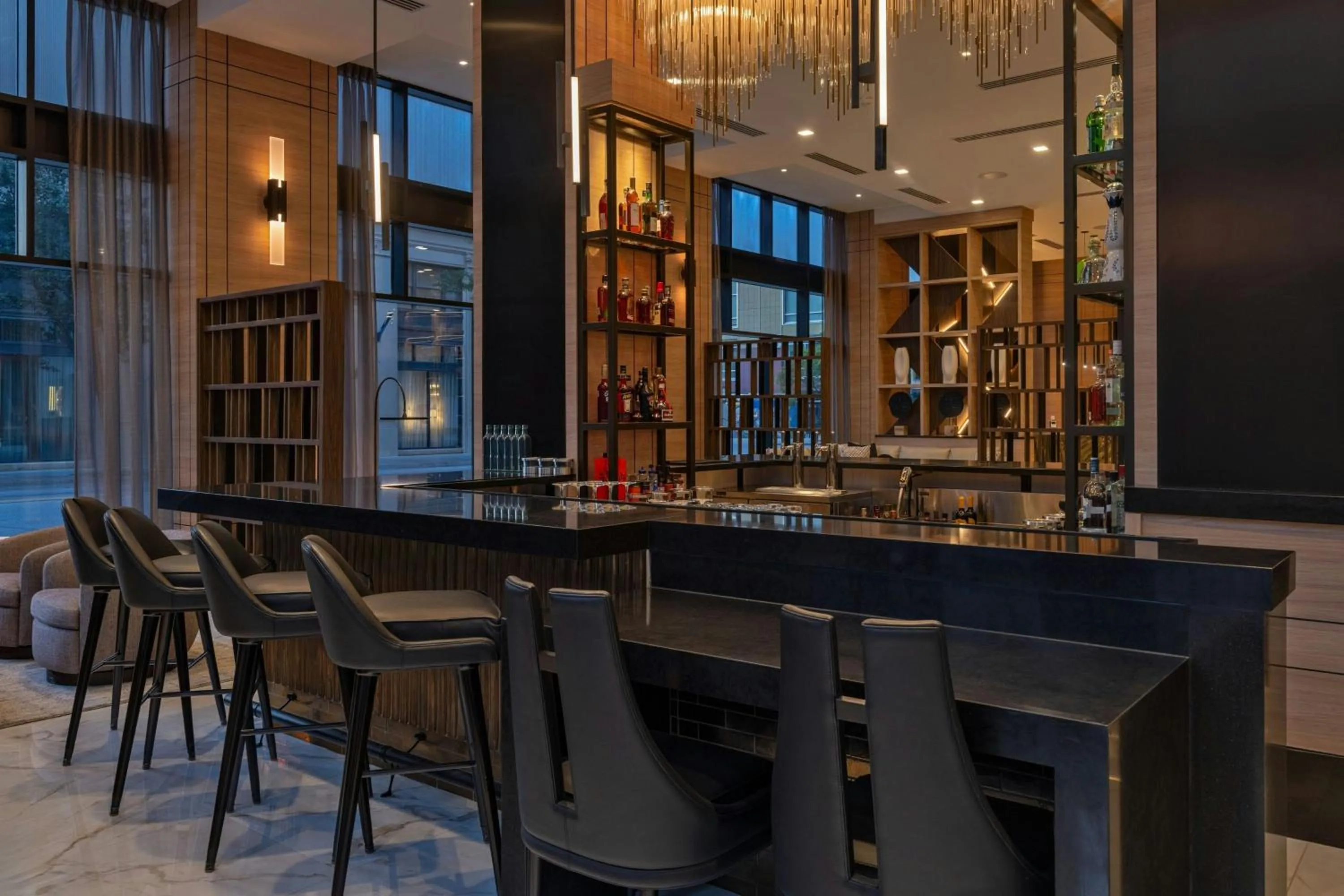 Lounge or bar in AC Hotel by Marriott Wichita Downtown