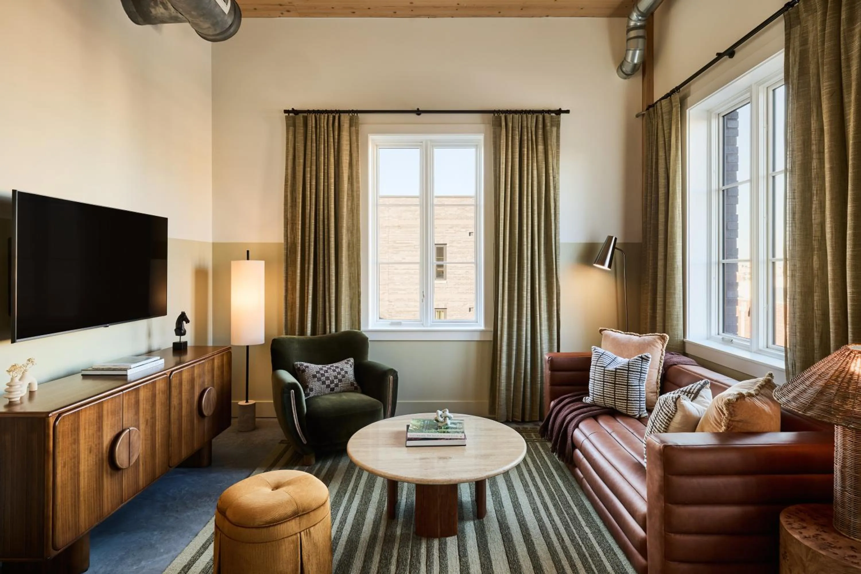 Living room in The Ann Savannah, Apartments by Marriott Bonvoy