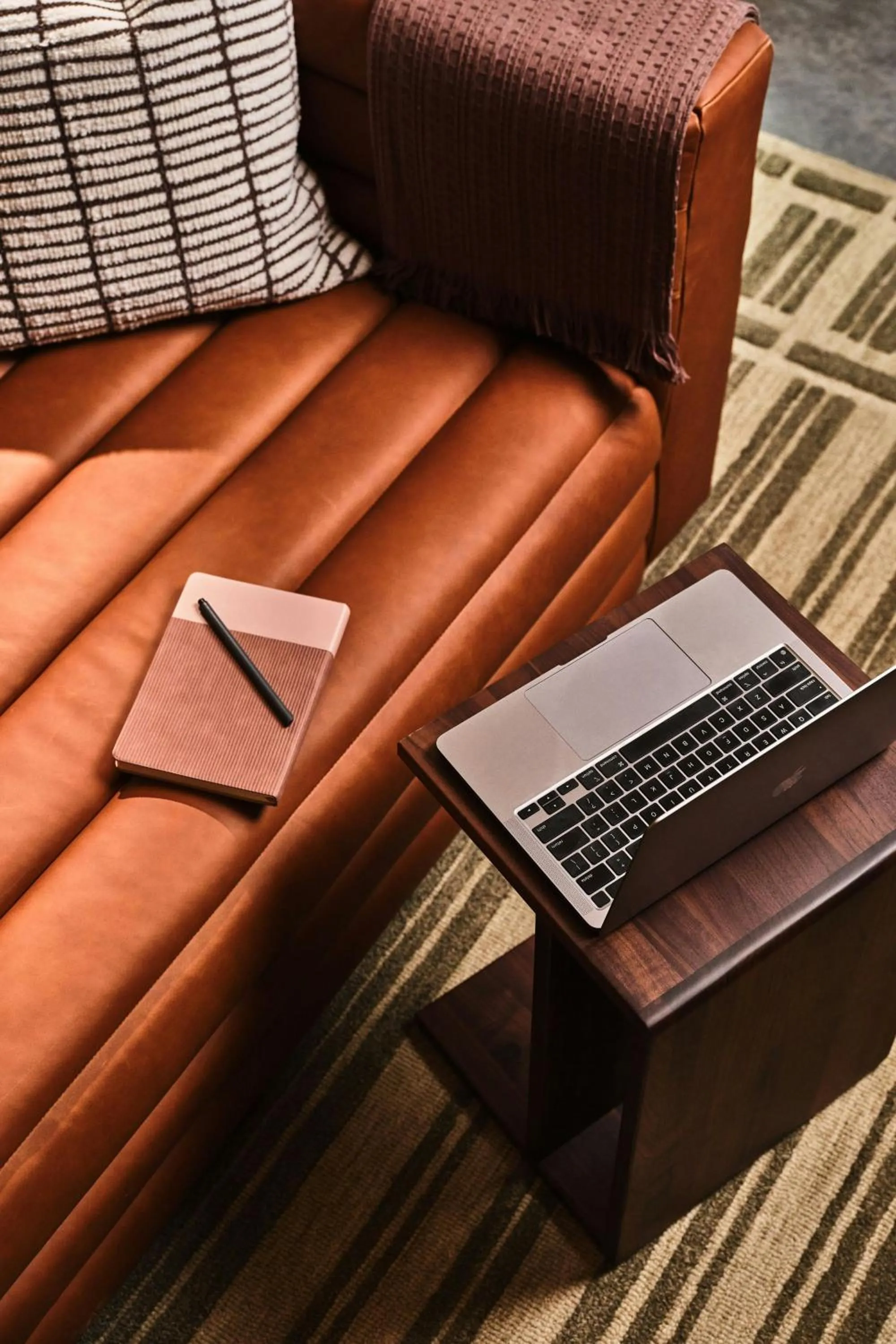 Living room in The Ann Savannah, Apartments by Marriott Bonvoy