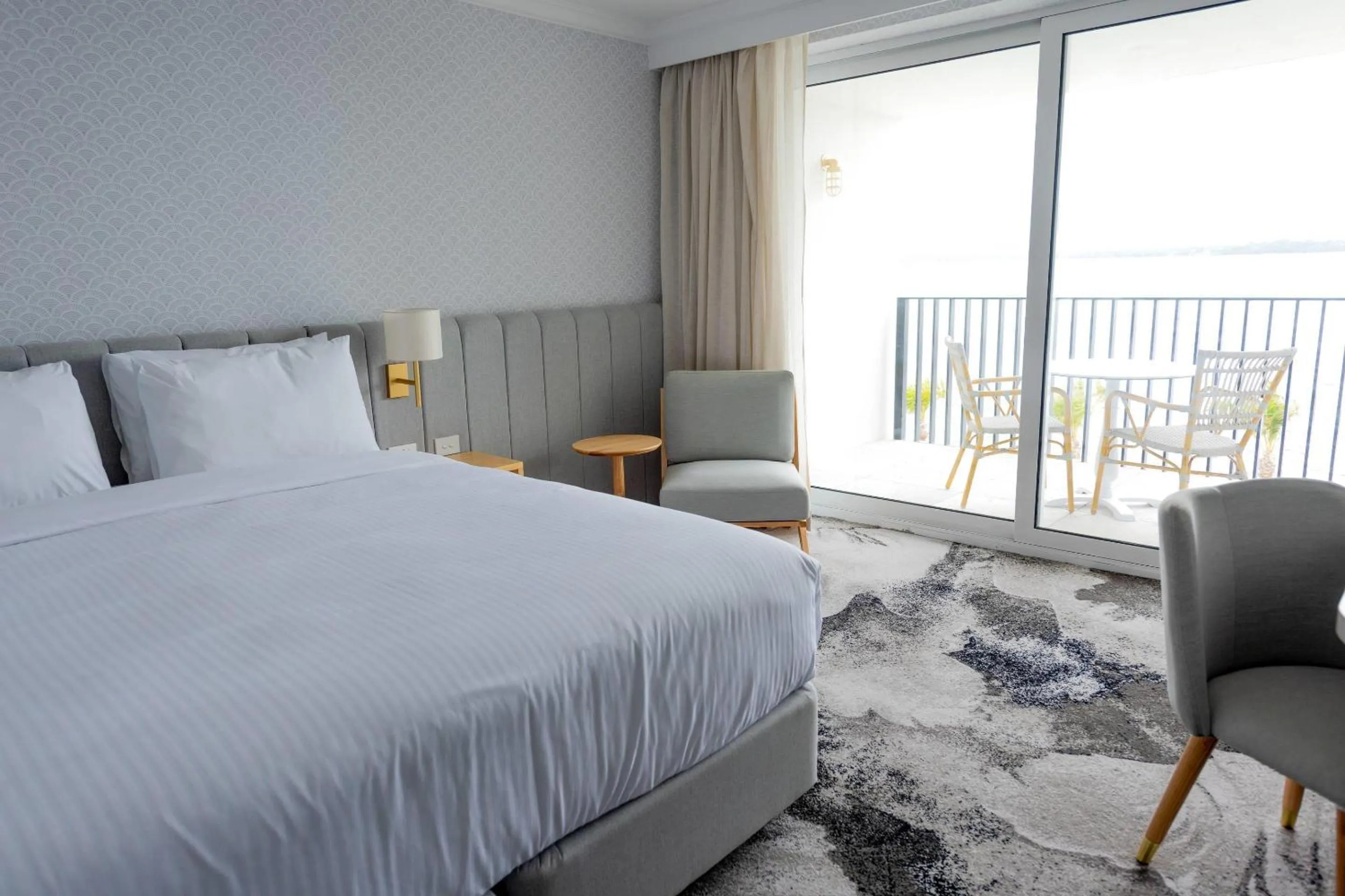 Bedroom, Bed in The Beachcomber Hotel & Resort, an Ascend Collection Resort