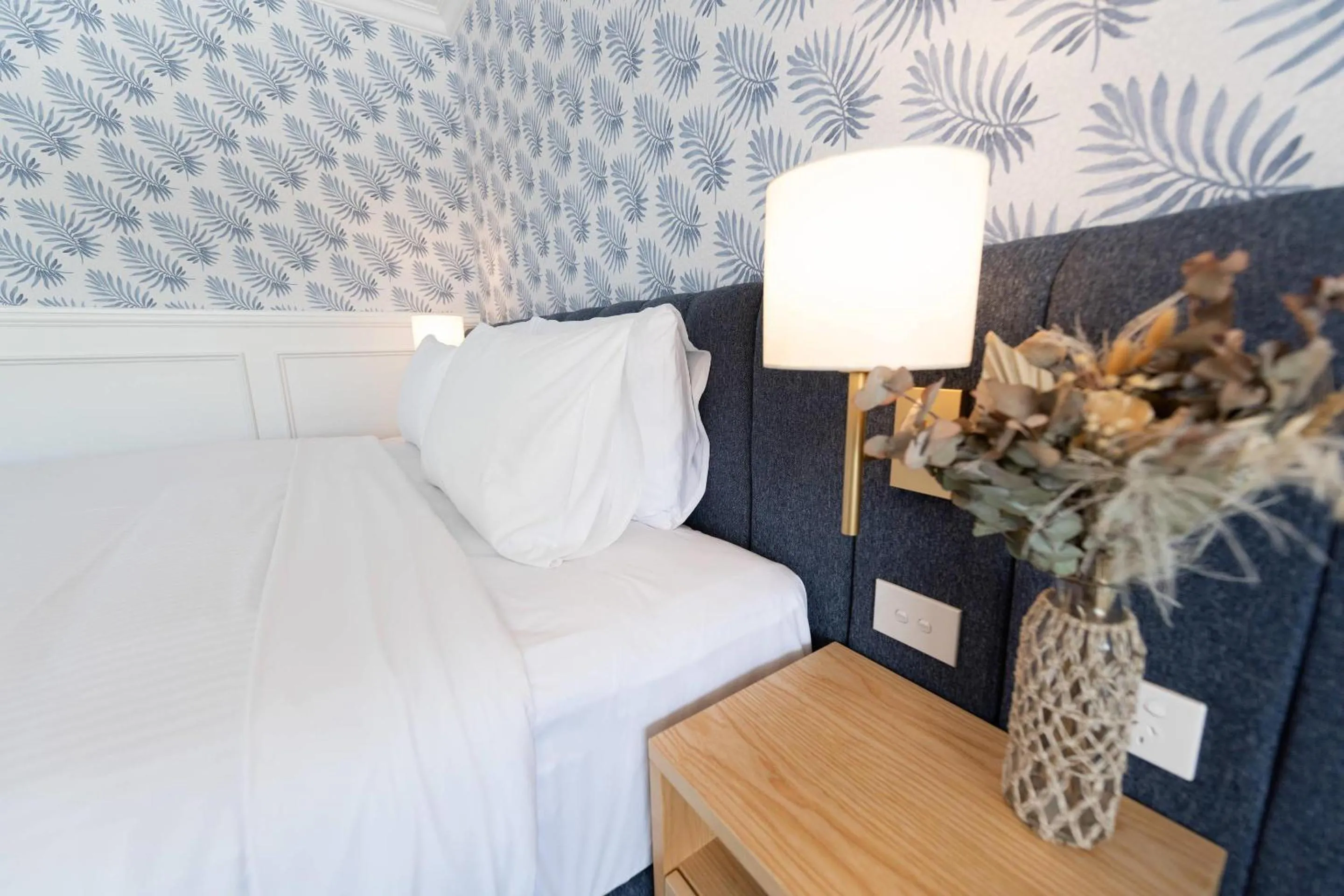 Bedroom, Bed in The Beachcomber Hotel & Resort, an Ascend Collection Resort