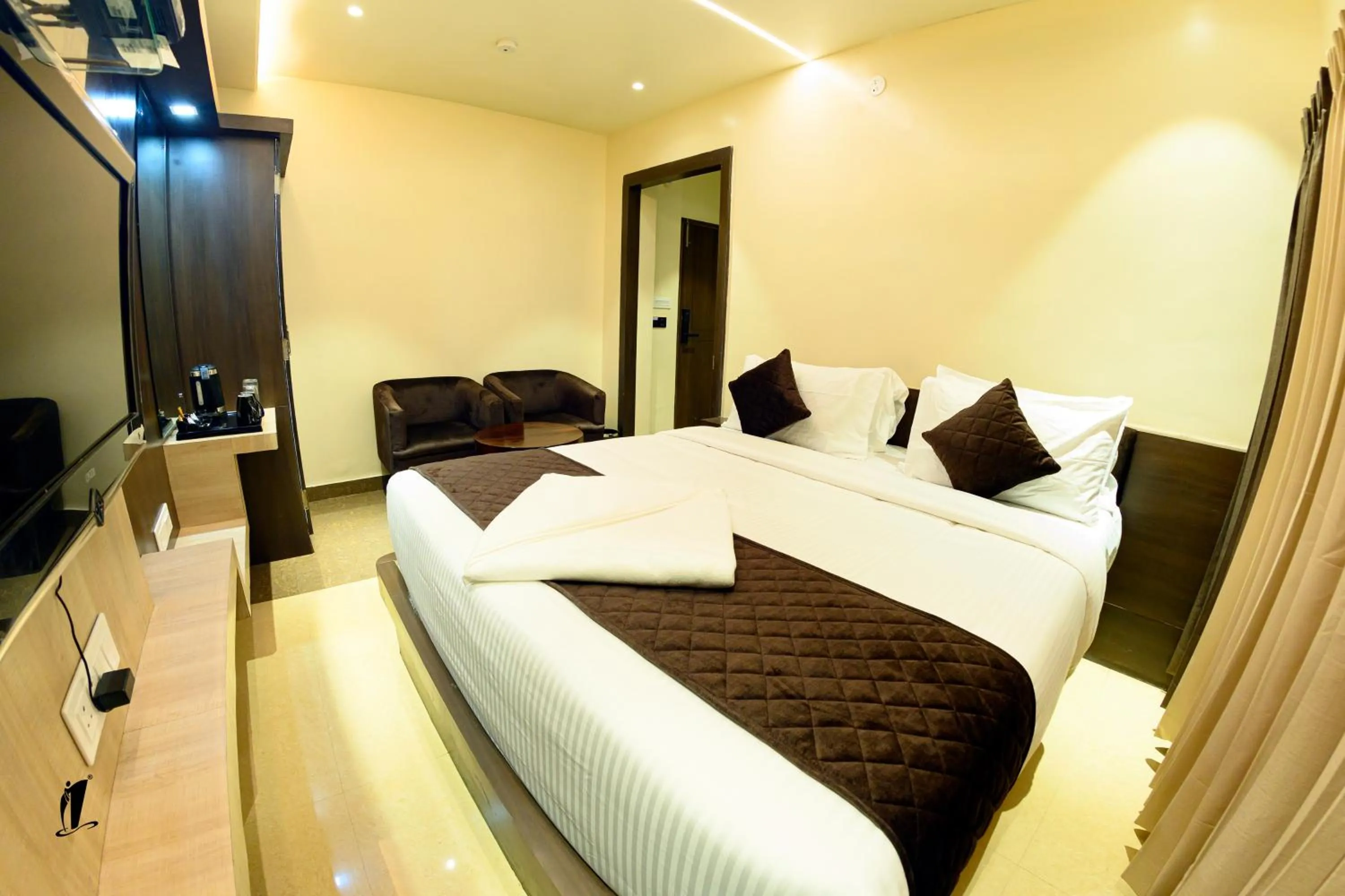 Bed in Srigandha Residency
