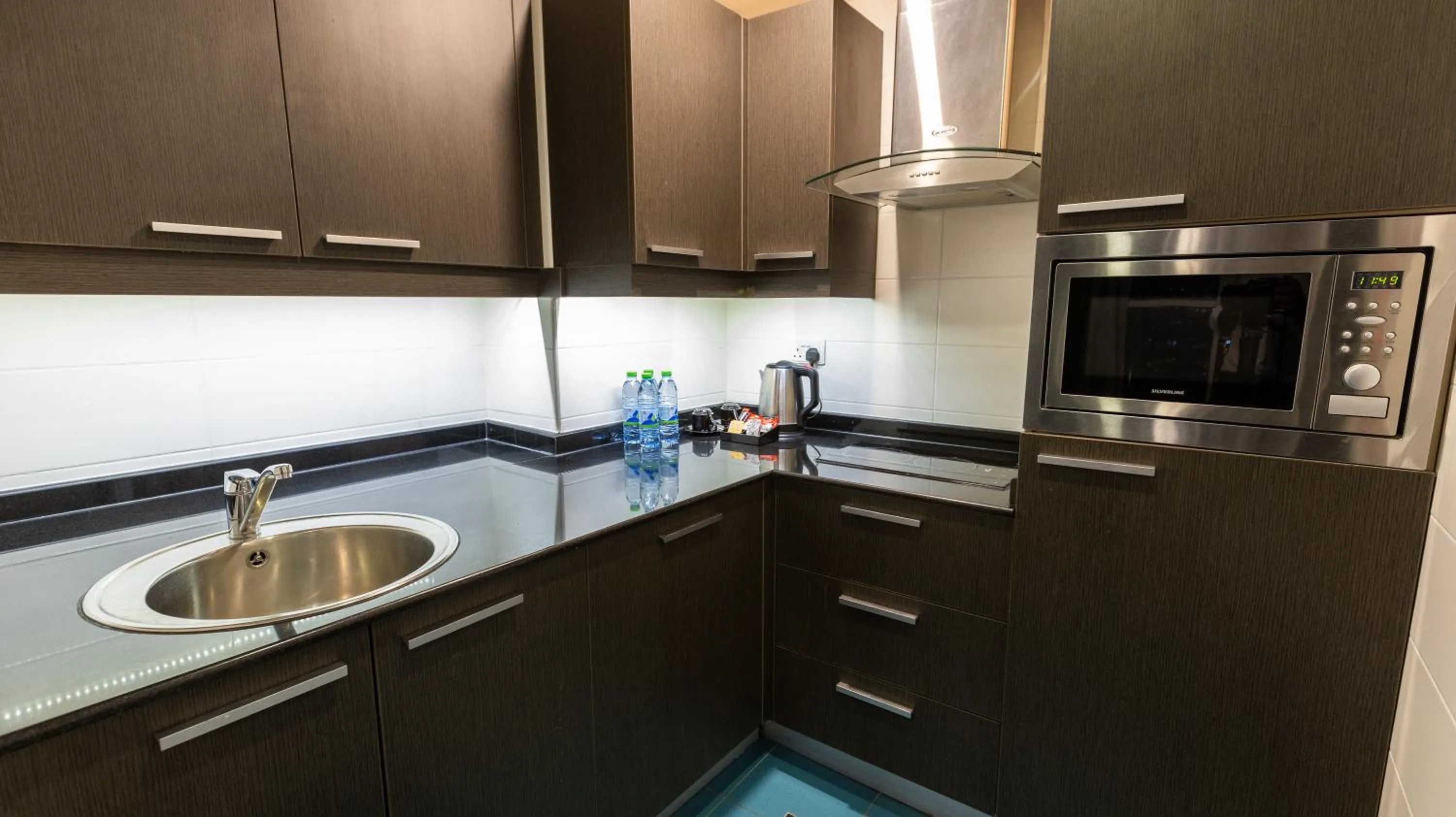 Kitchen or kitchenette in S Hotel Bahrain
