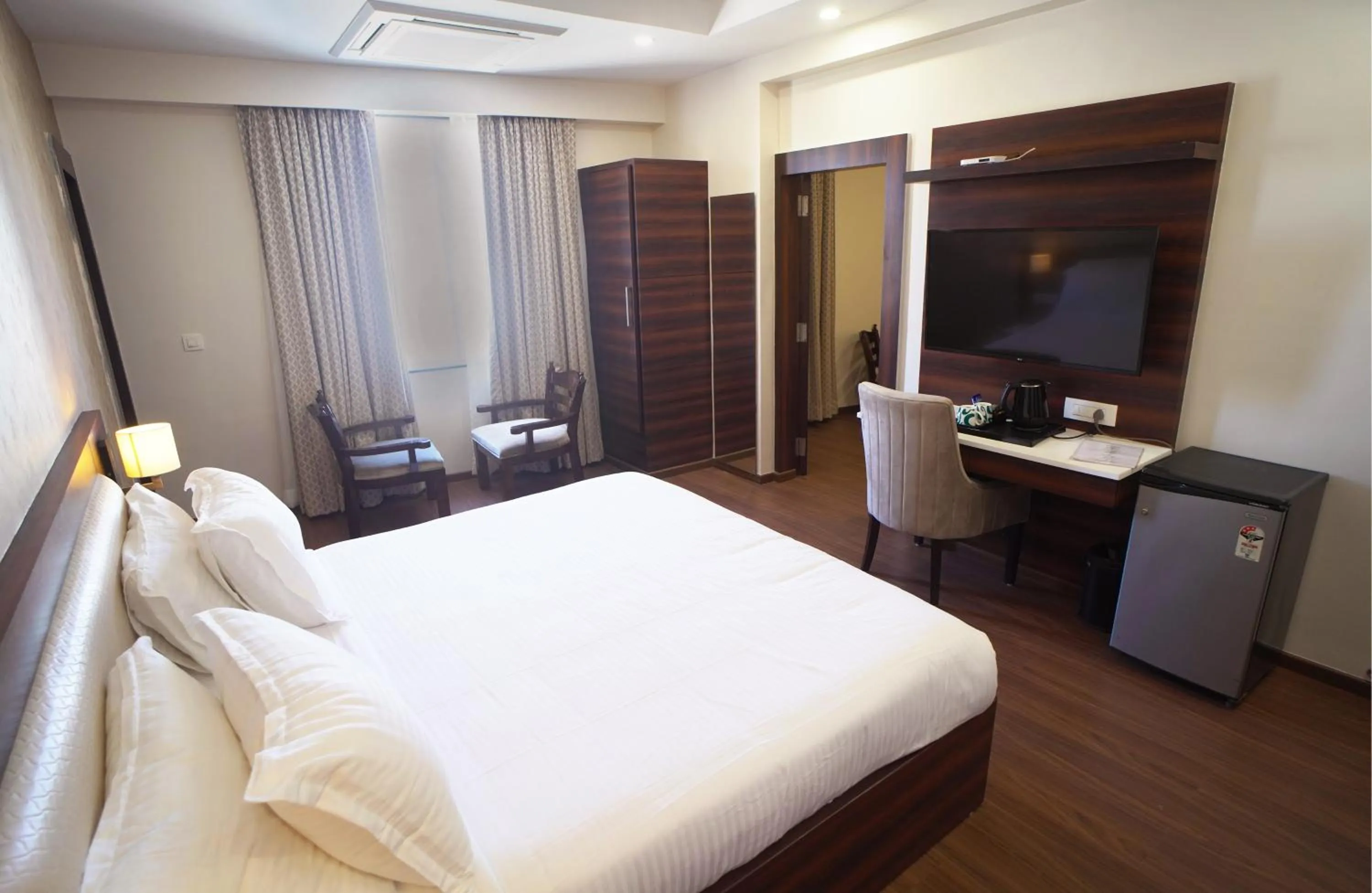Bedroom, Bed in Sai Maa Hotel & Residency