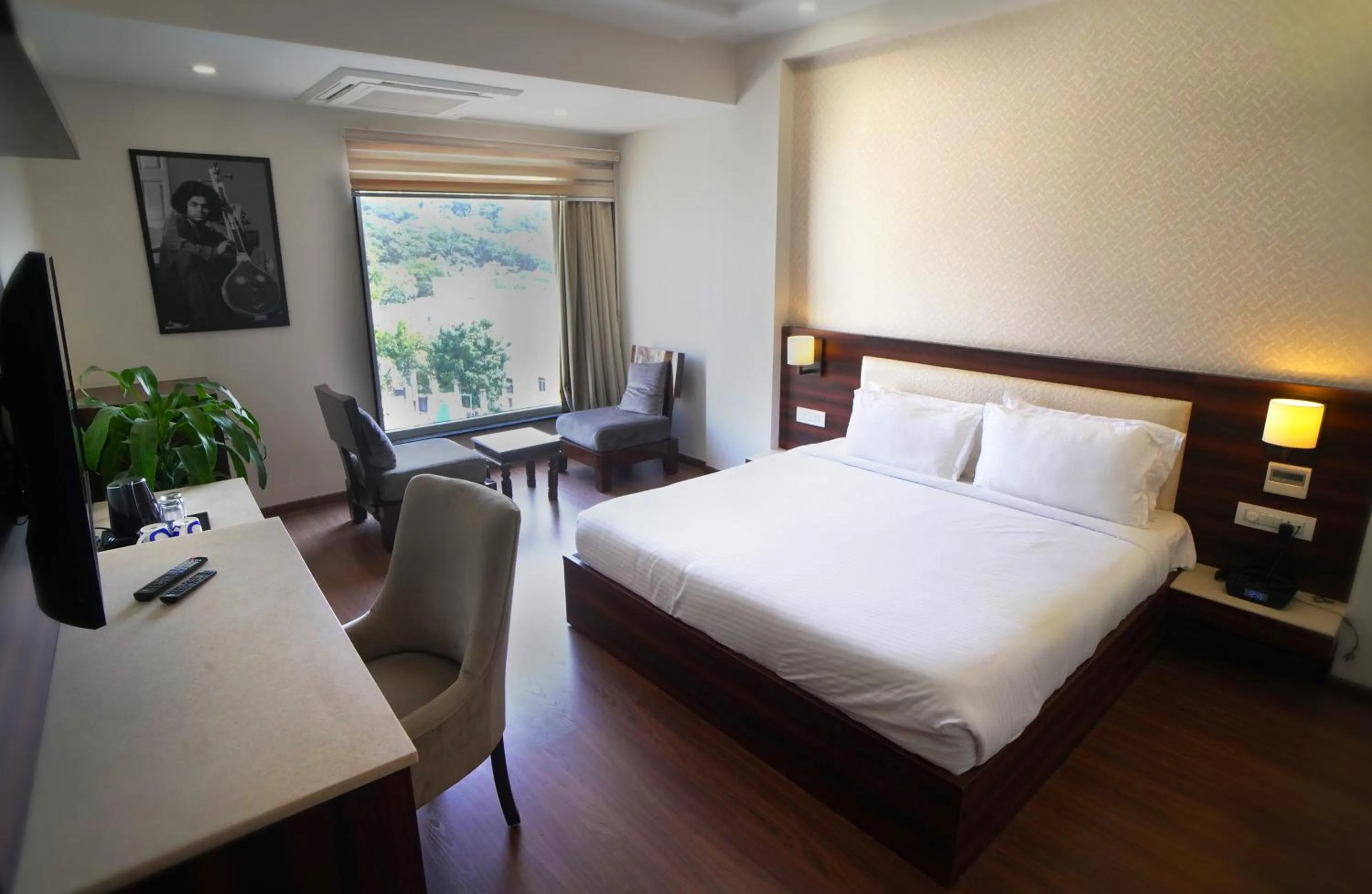 Photo of the whole room, Bed in Sai Maa Hotel & Residency