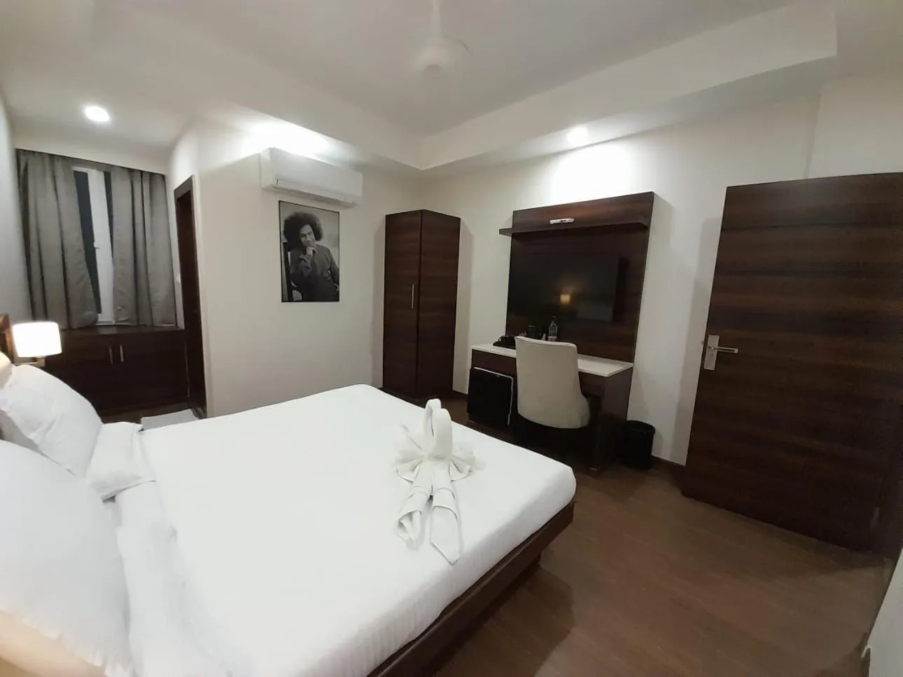 Photo of the whole room, Bed in Sai Maa Hotel & Residency