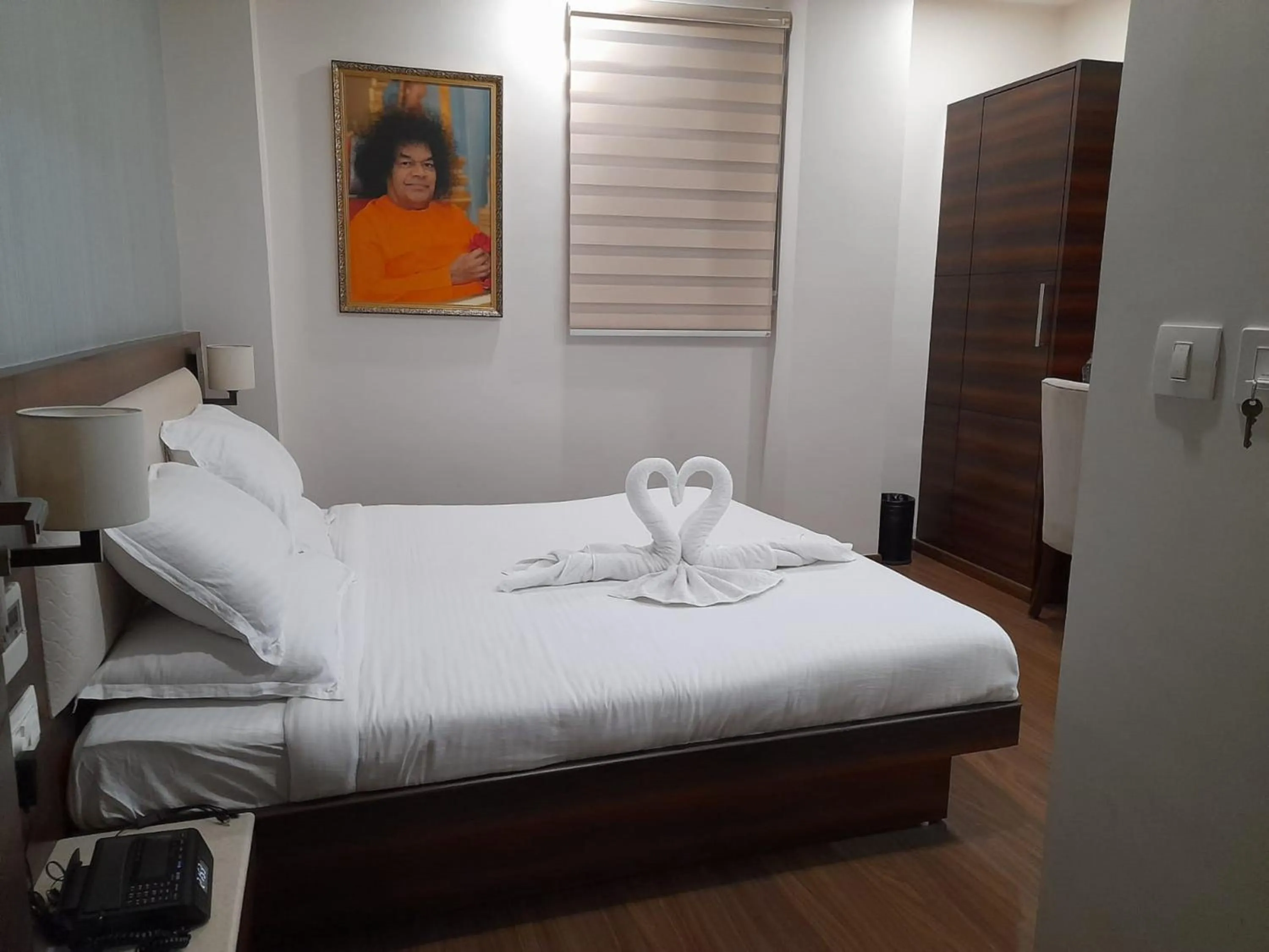 Bedroom, Bed in Sai Maa Hotel & Residency