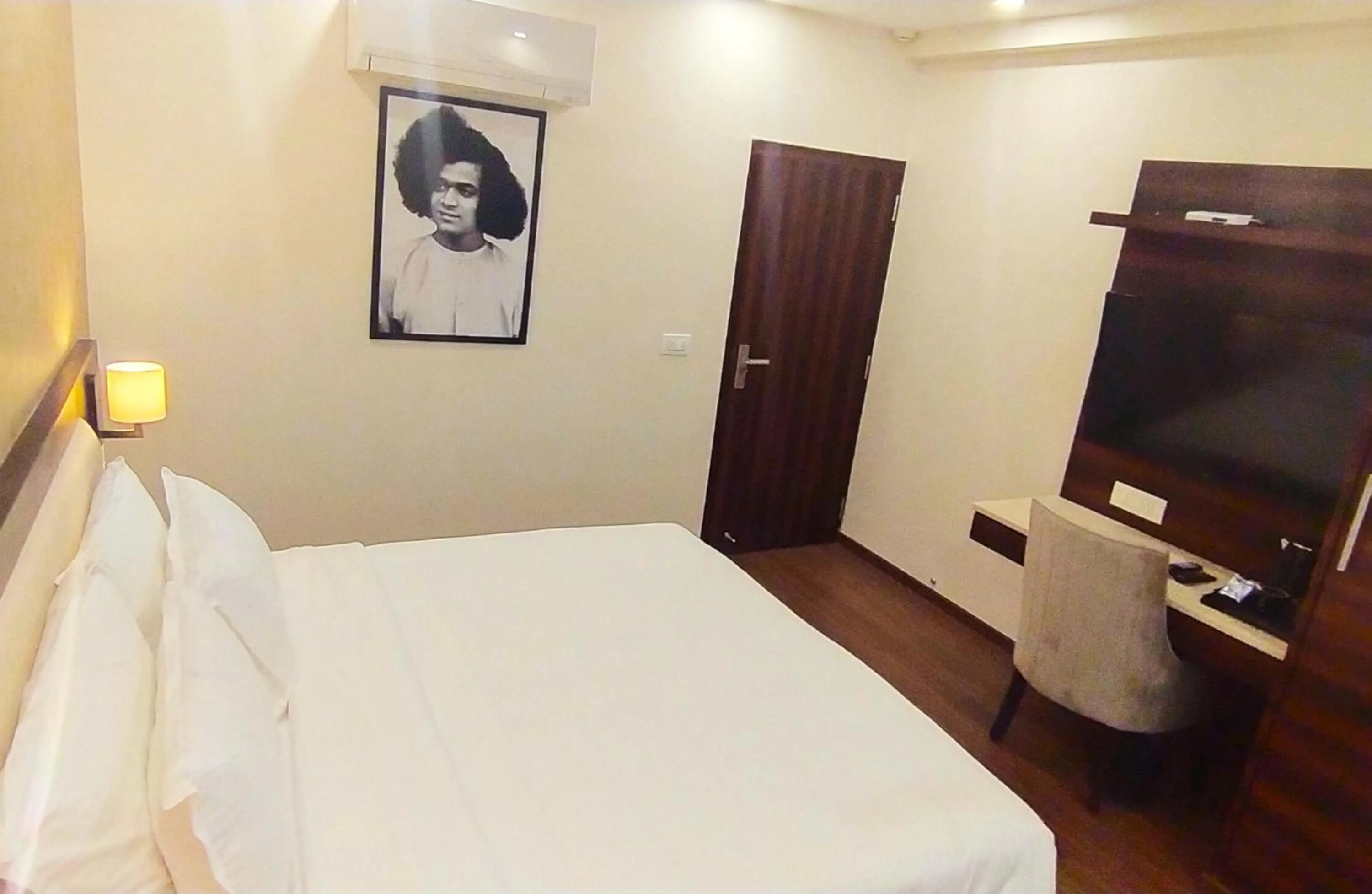 Photo of the whole room, Bed in Sai Maa Hotel & Residency