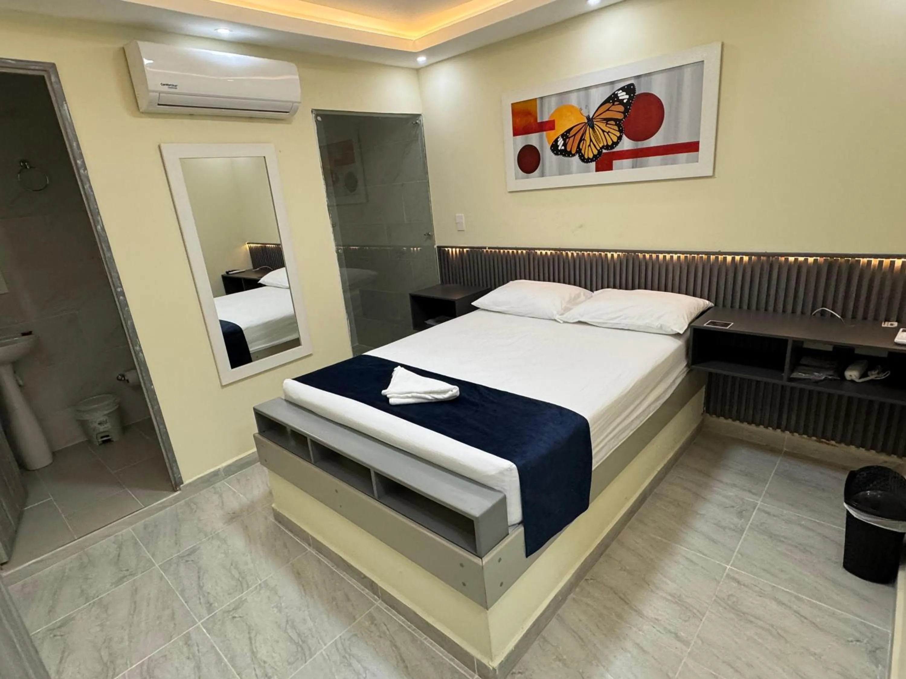 Bed in Hotel Magistral Suiter