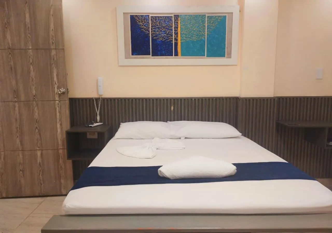 Bed in Hotel Magistral Suiter