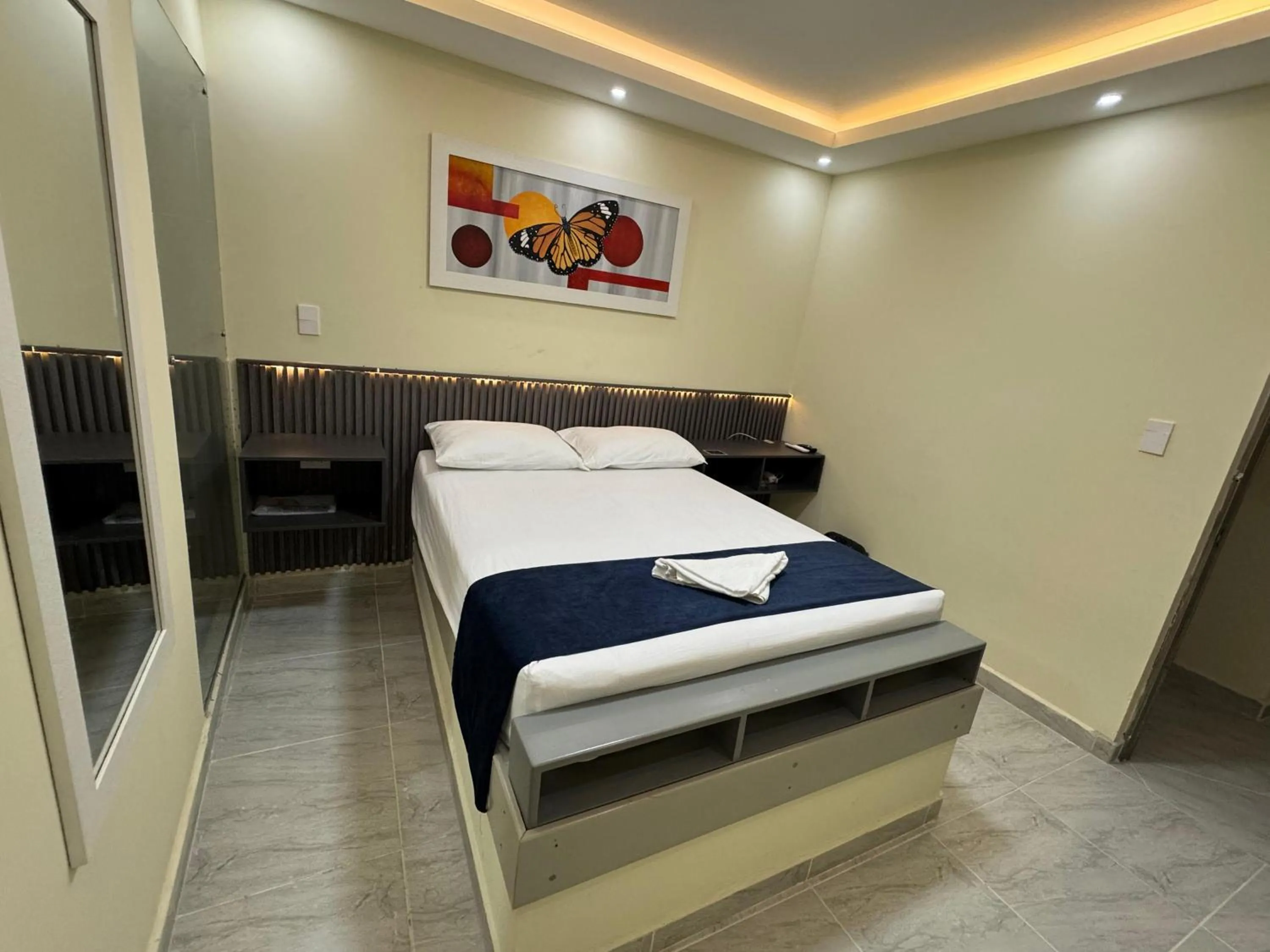 Bed in Hotel Magistral Suiter