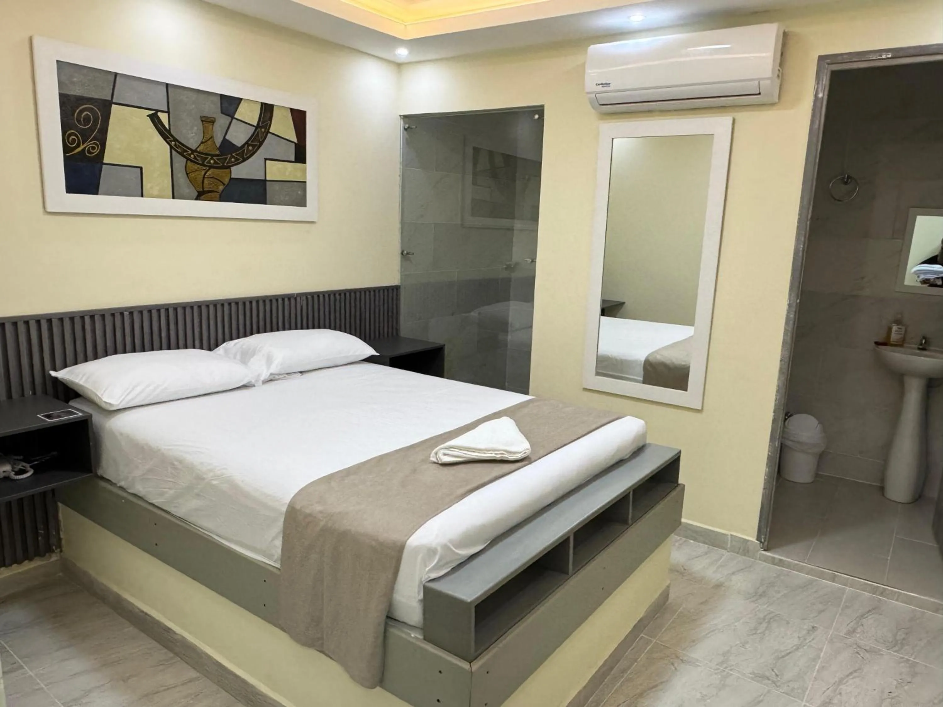 Bed in Hotel Magistral Suiter