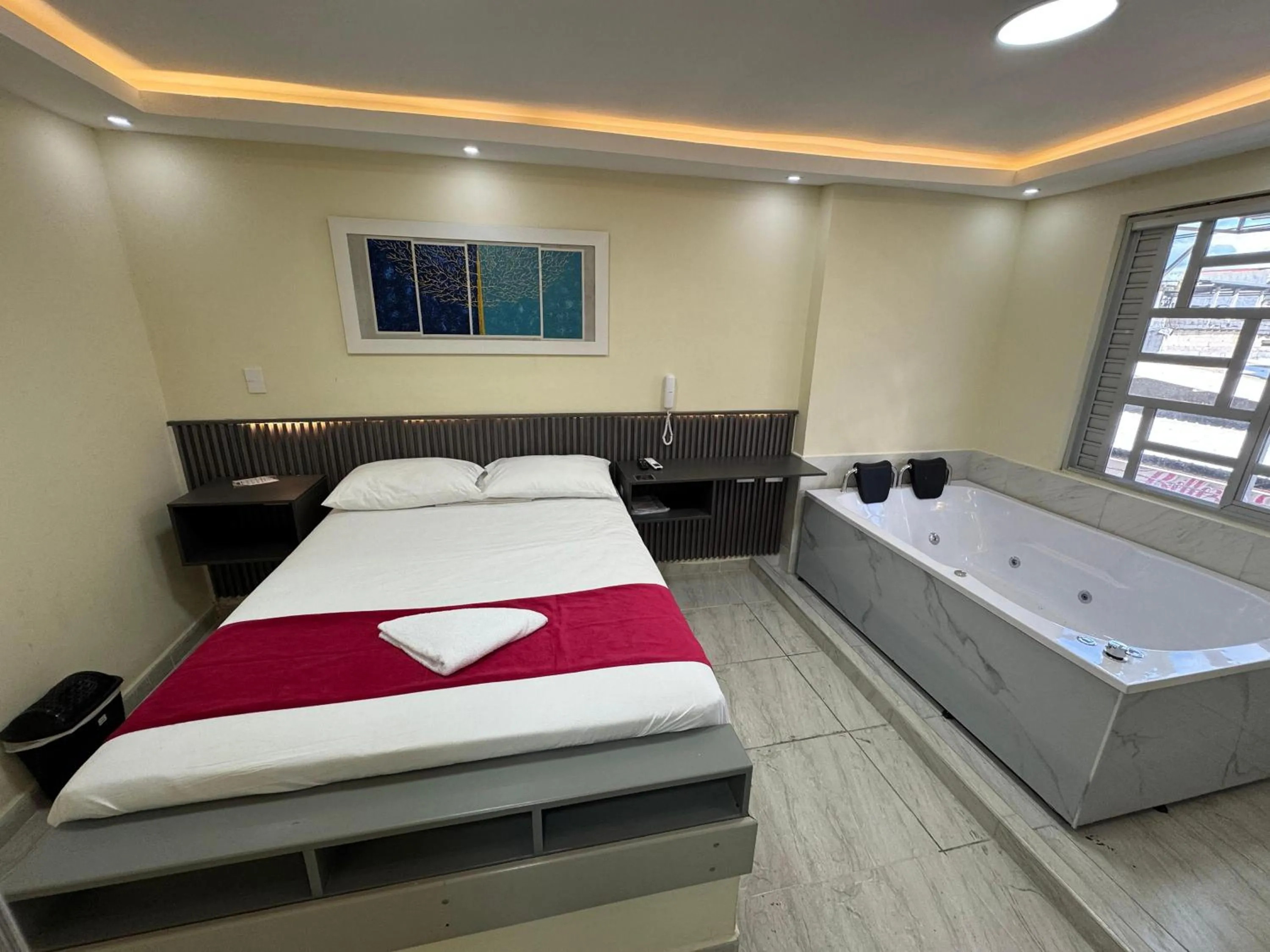 Bed in Hotel Magistral Suiter