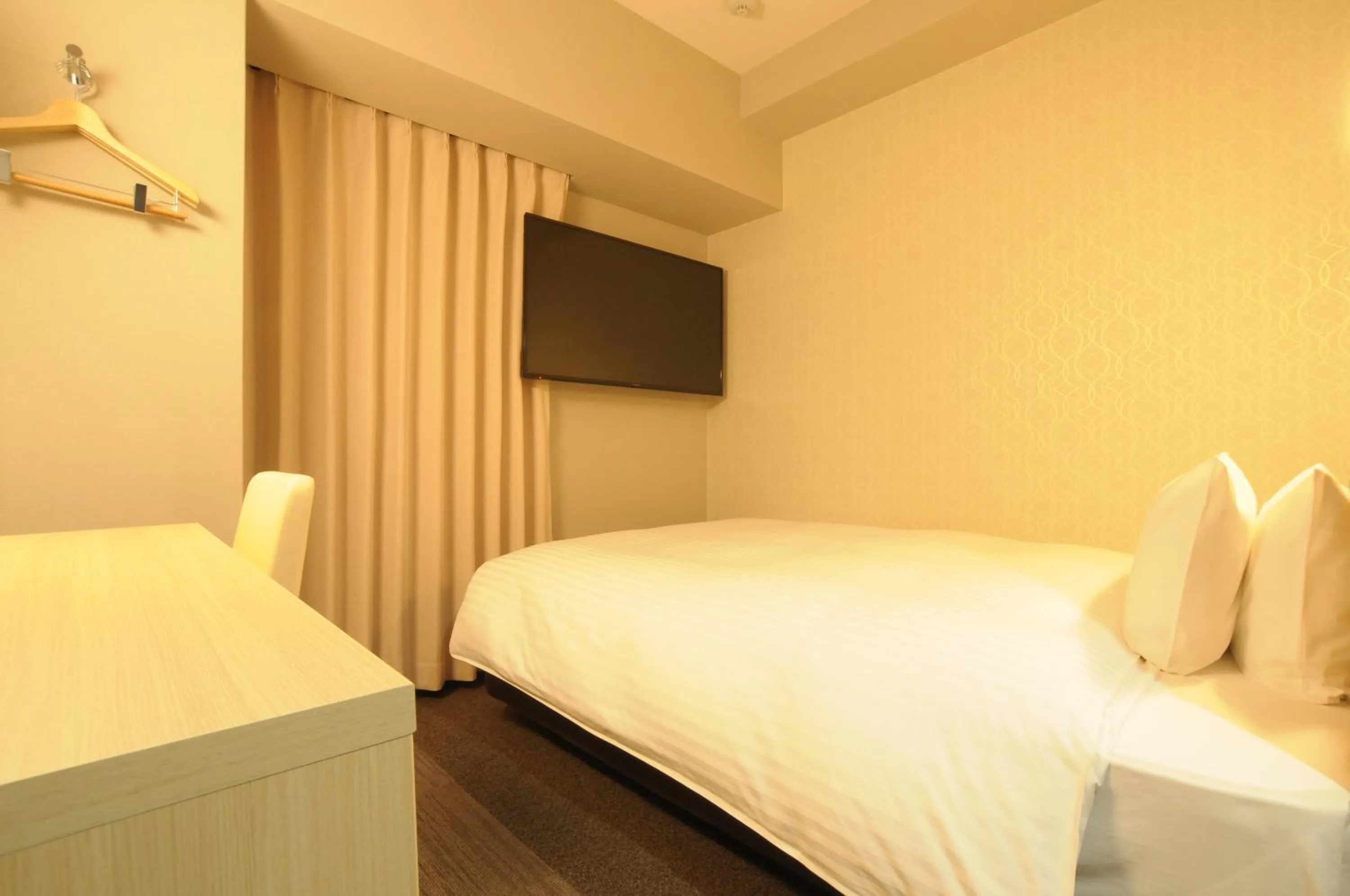 Bed in AB Hotel Tahara