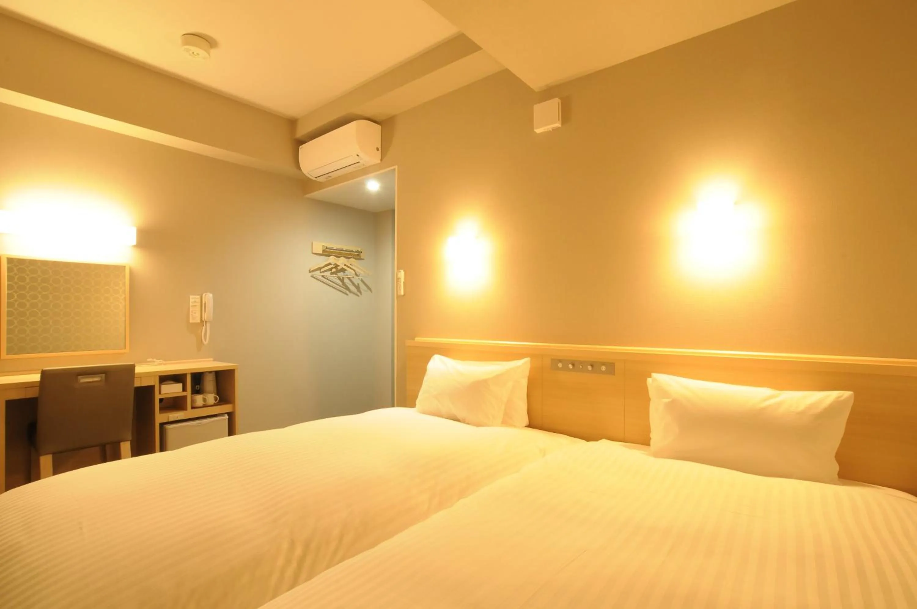 Bed in AB Hotel Tahara