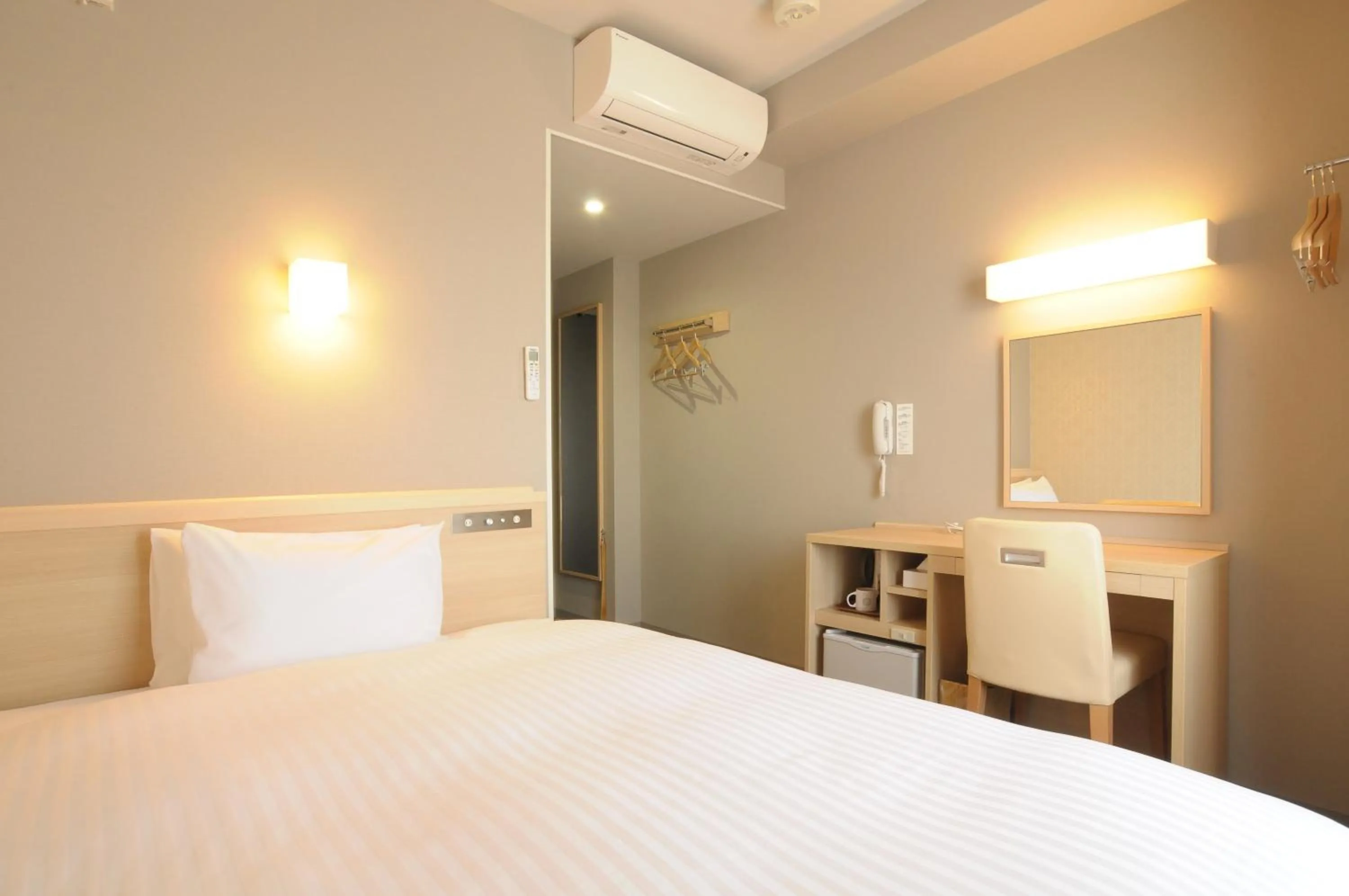 Bed in AB Hotel Tahara