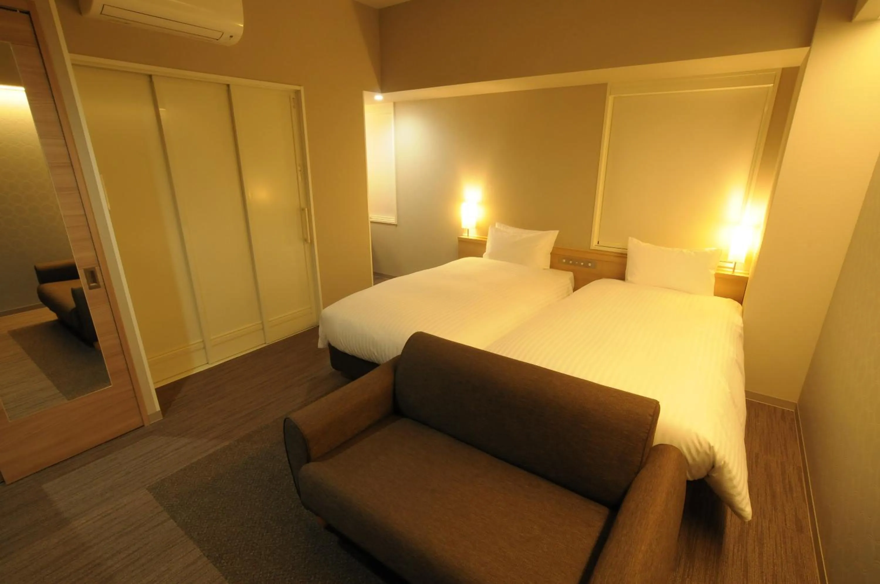 Bed in AB Hotel Tahara