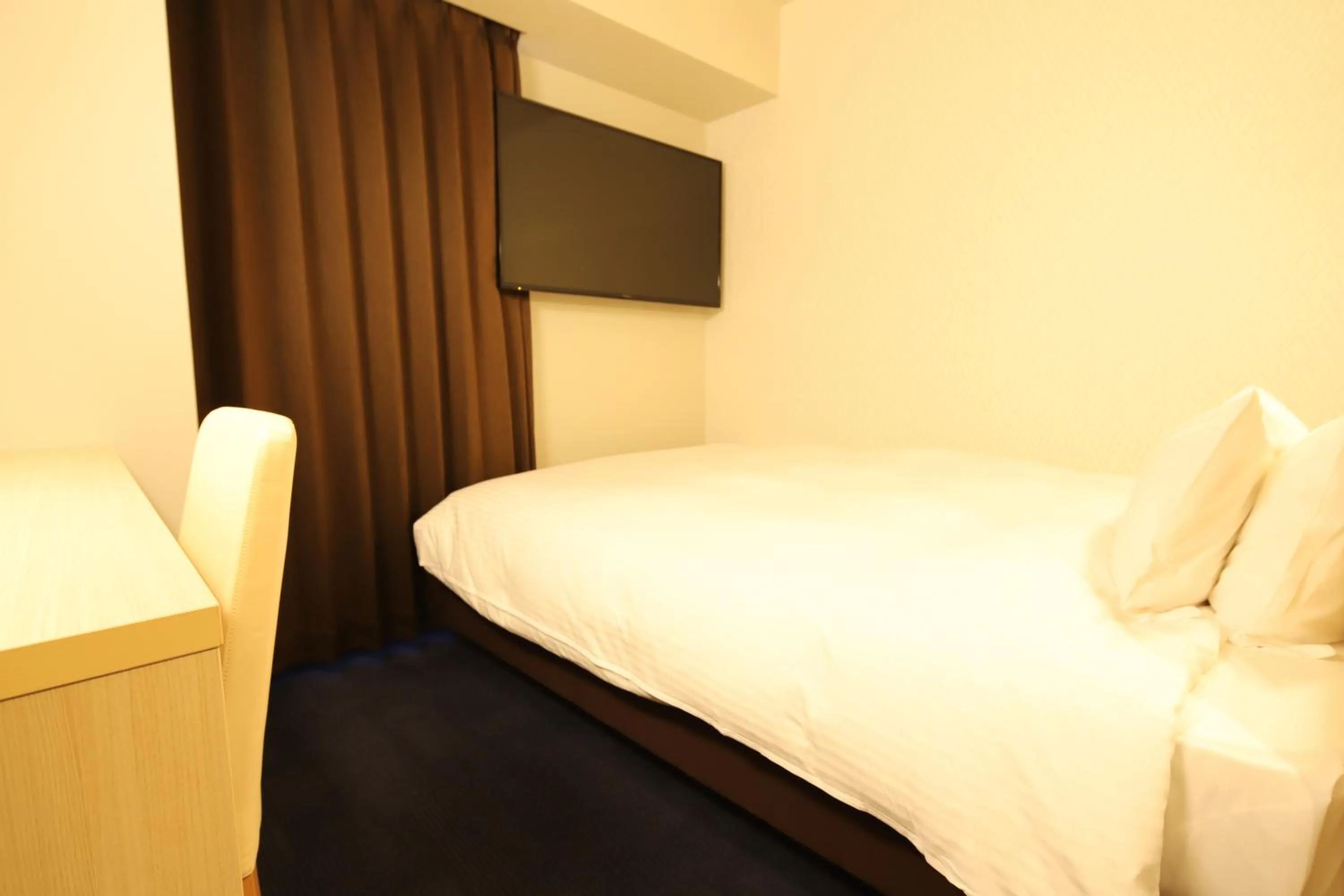 Bed in AB Hotel Gamagori