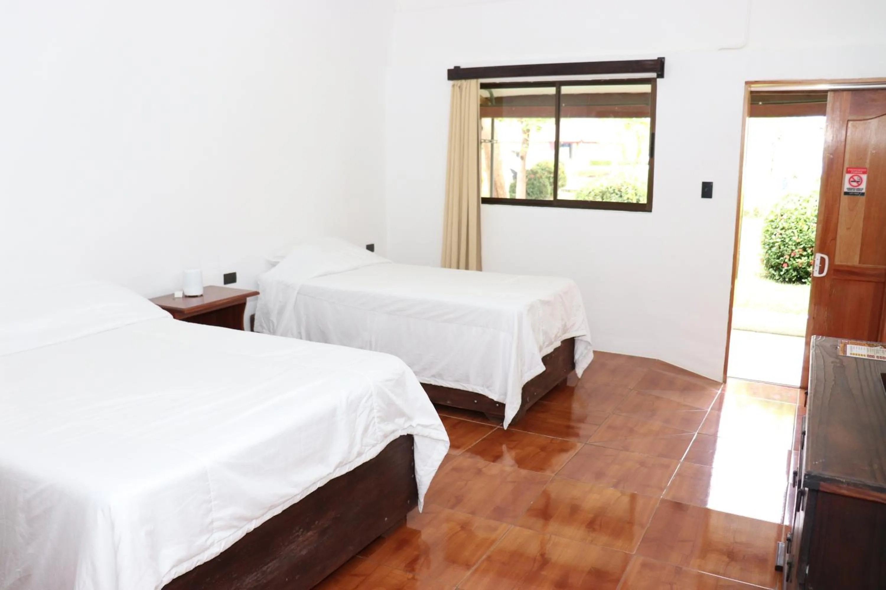 Photo of the whole room, Bed in Hotel Samoa del Sur