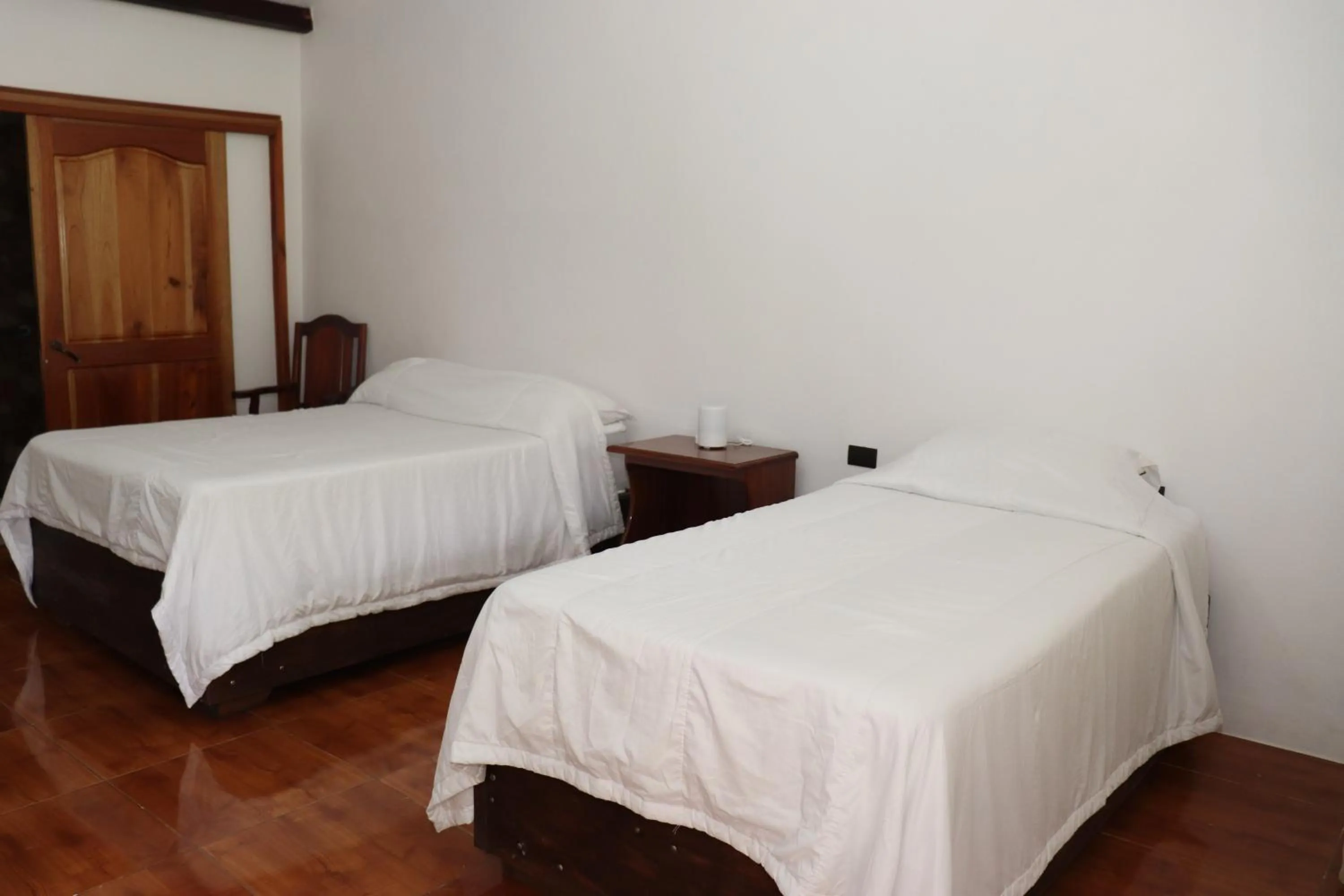 Bed in Hotel Samoa del Sur