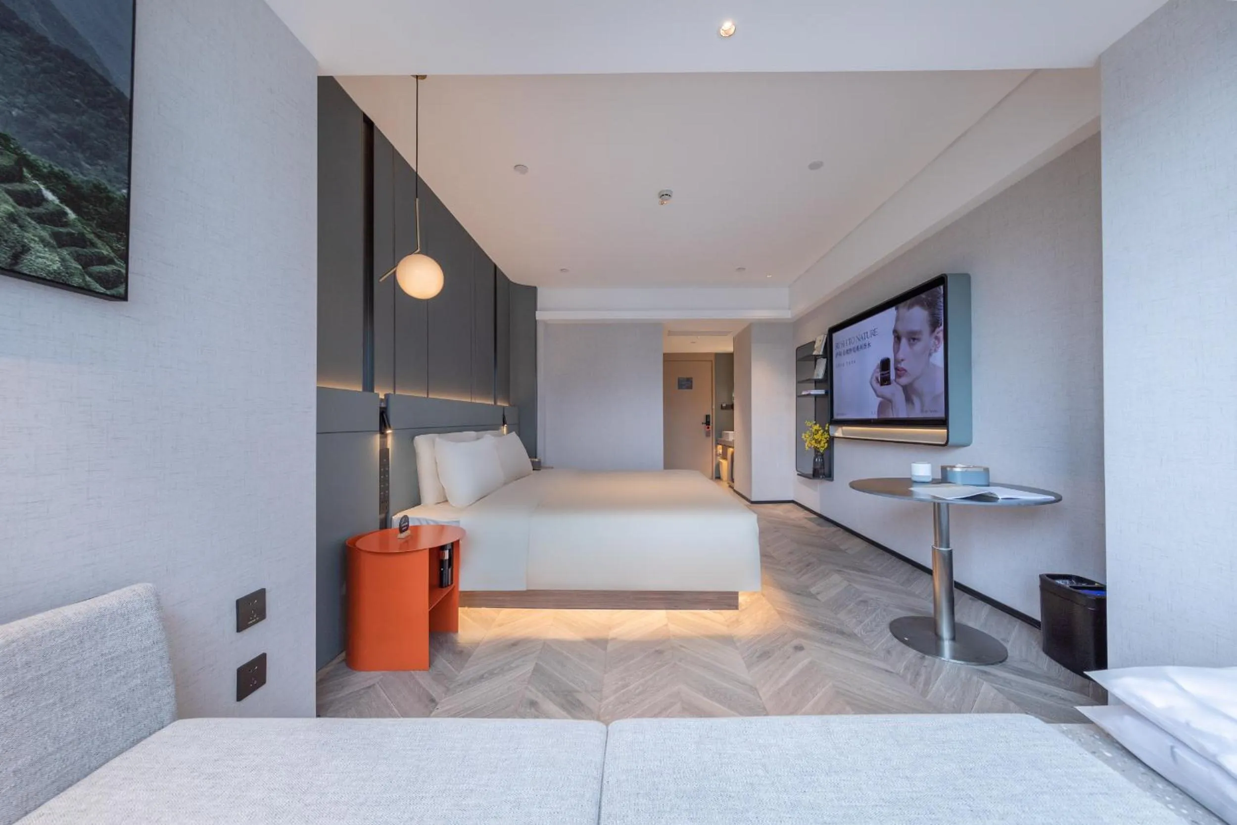 Photo of the whole room, Bed in Atour Hotel Wuhan Wuchang Zhongnan Road