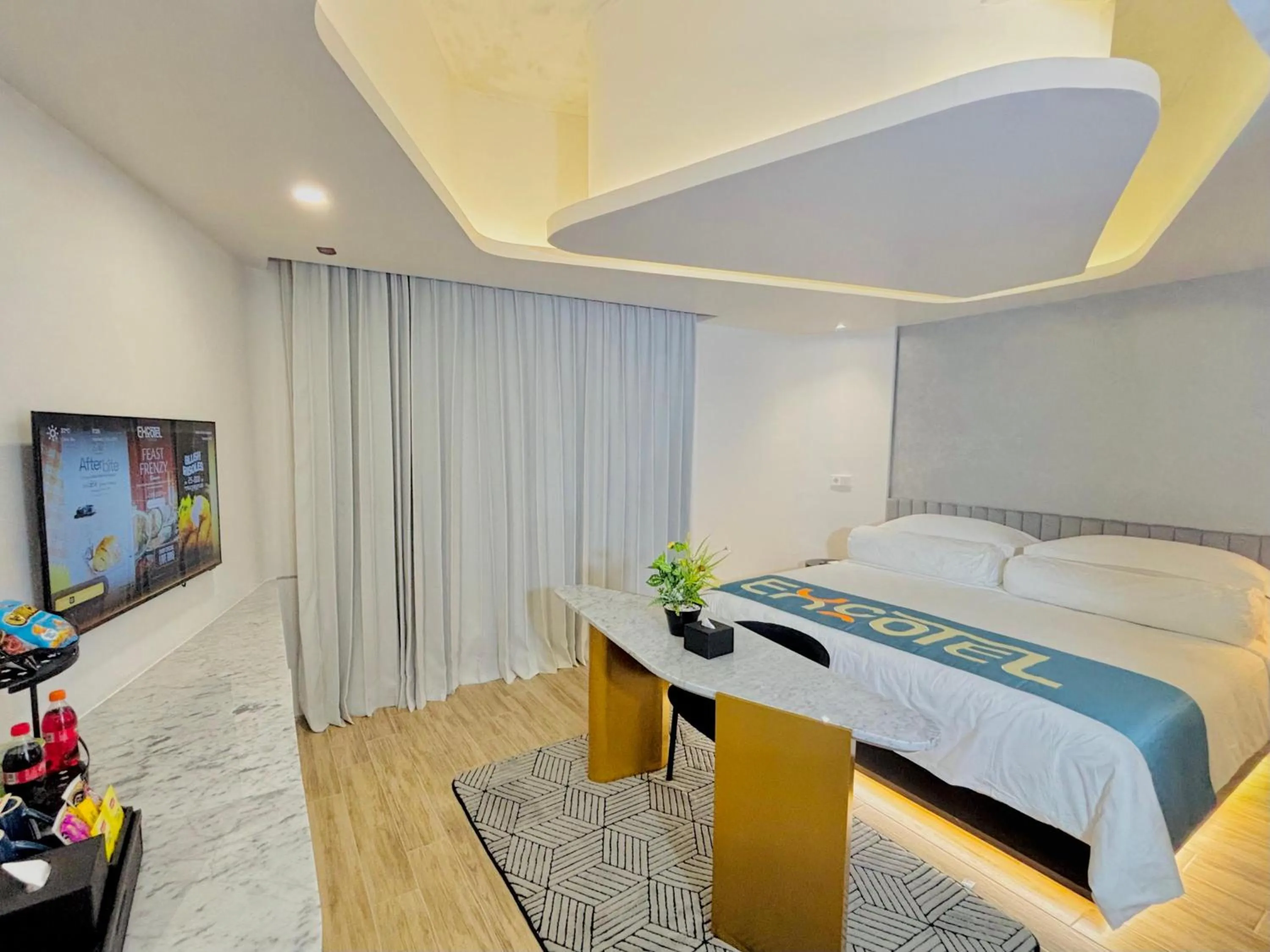 Bed in EXCOTEL Design Hotel Surabaya