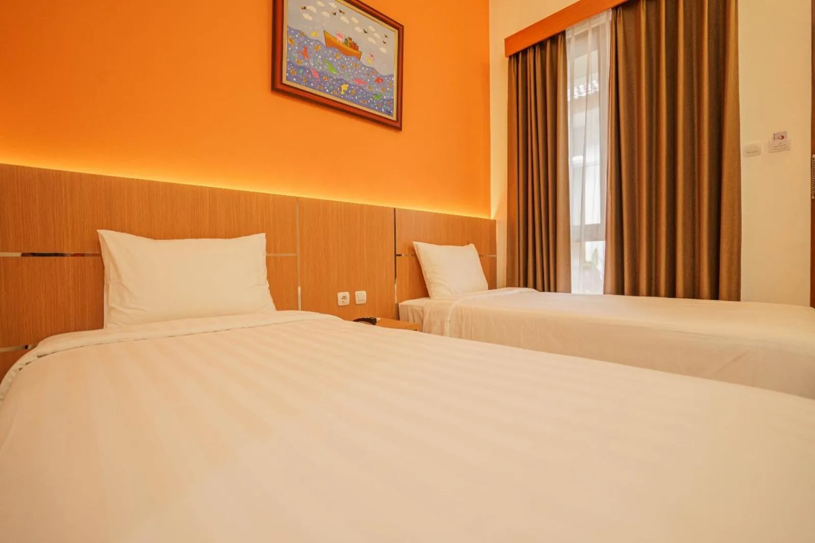 Bed in The Cabin Hotel Lovina Bali