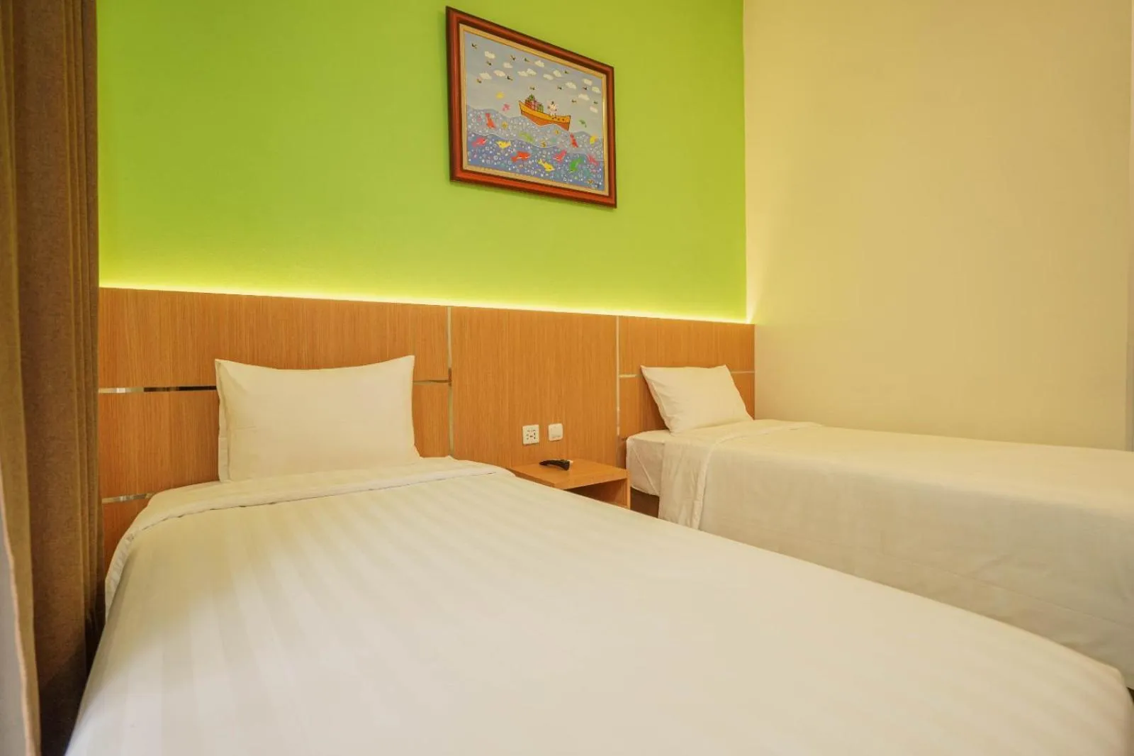 Bed in The Cabin Hotel Lovina Bali