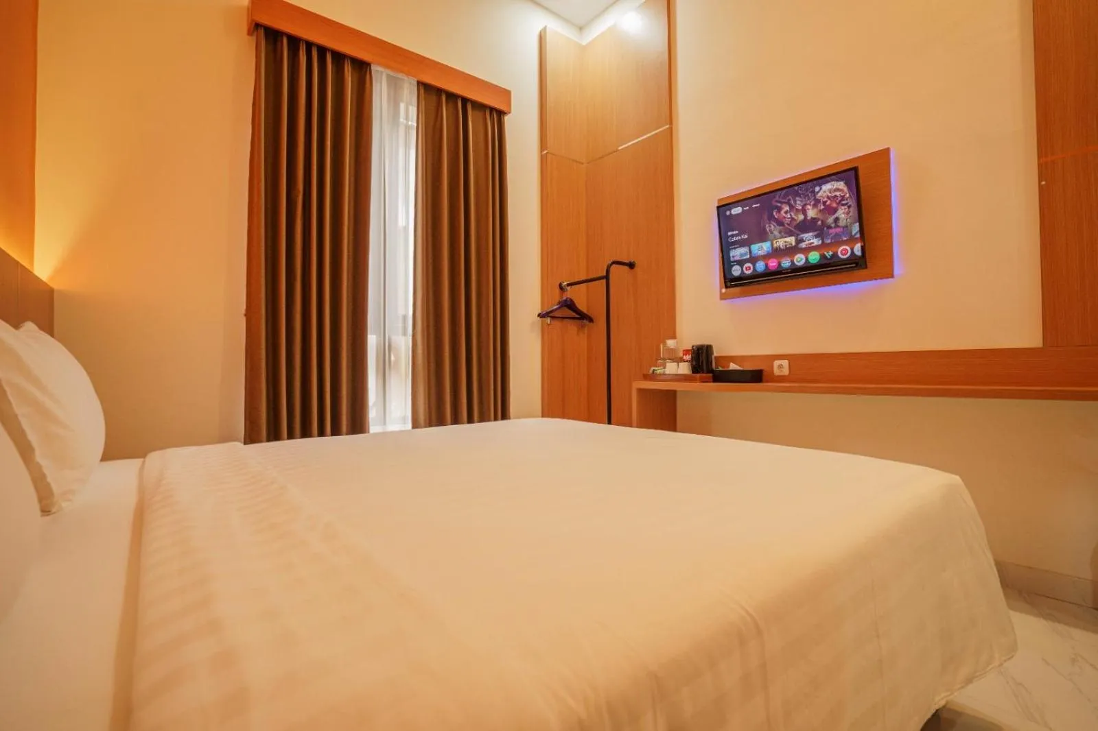 Bed in The Cabin Hotel Lovina Bali