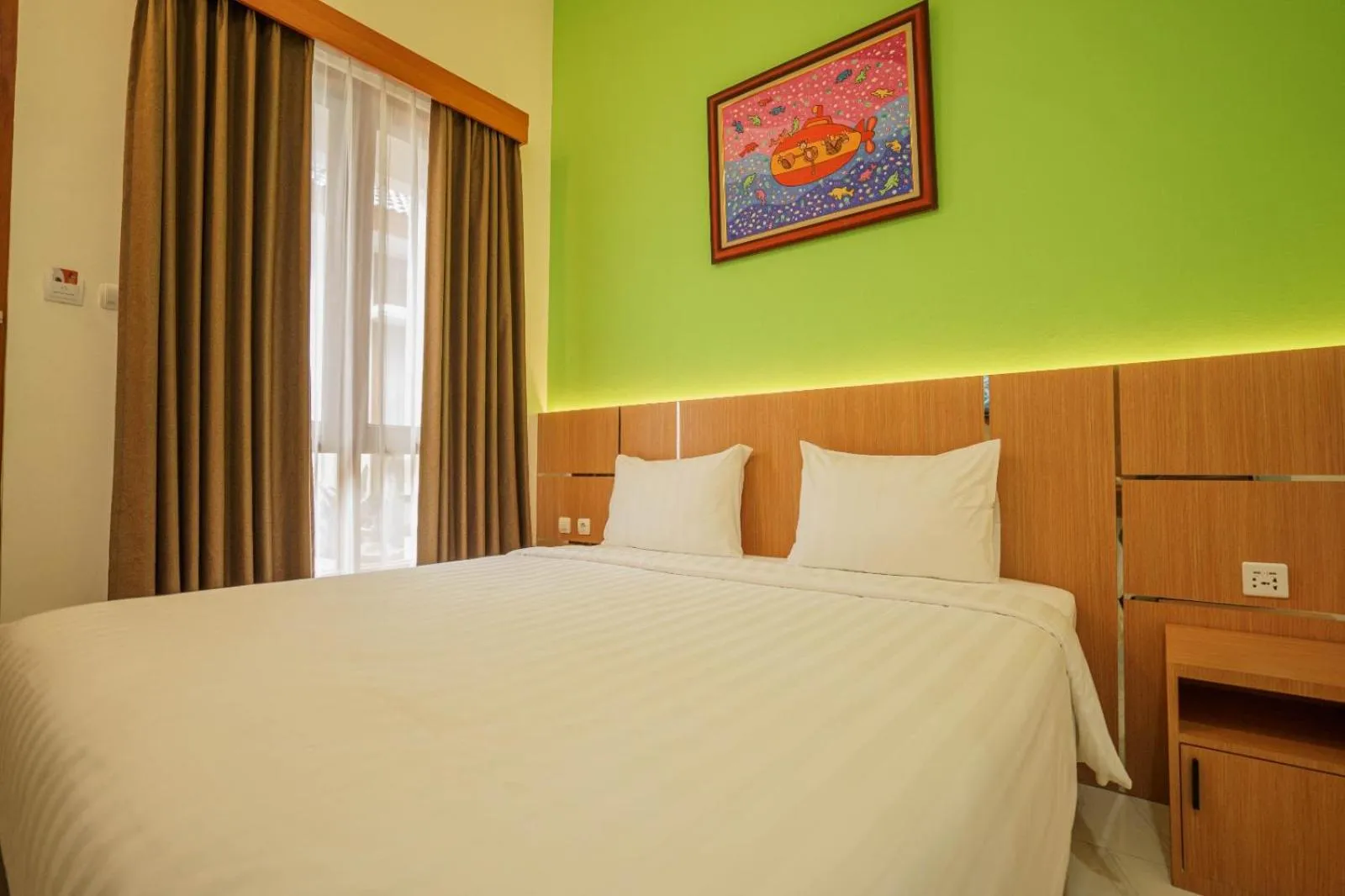 Bed in The Cabin Hotel Lovina Bali