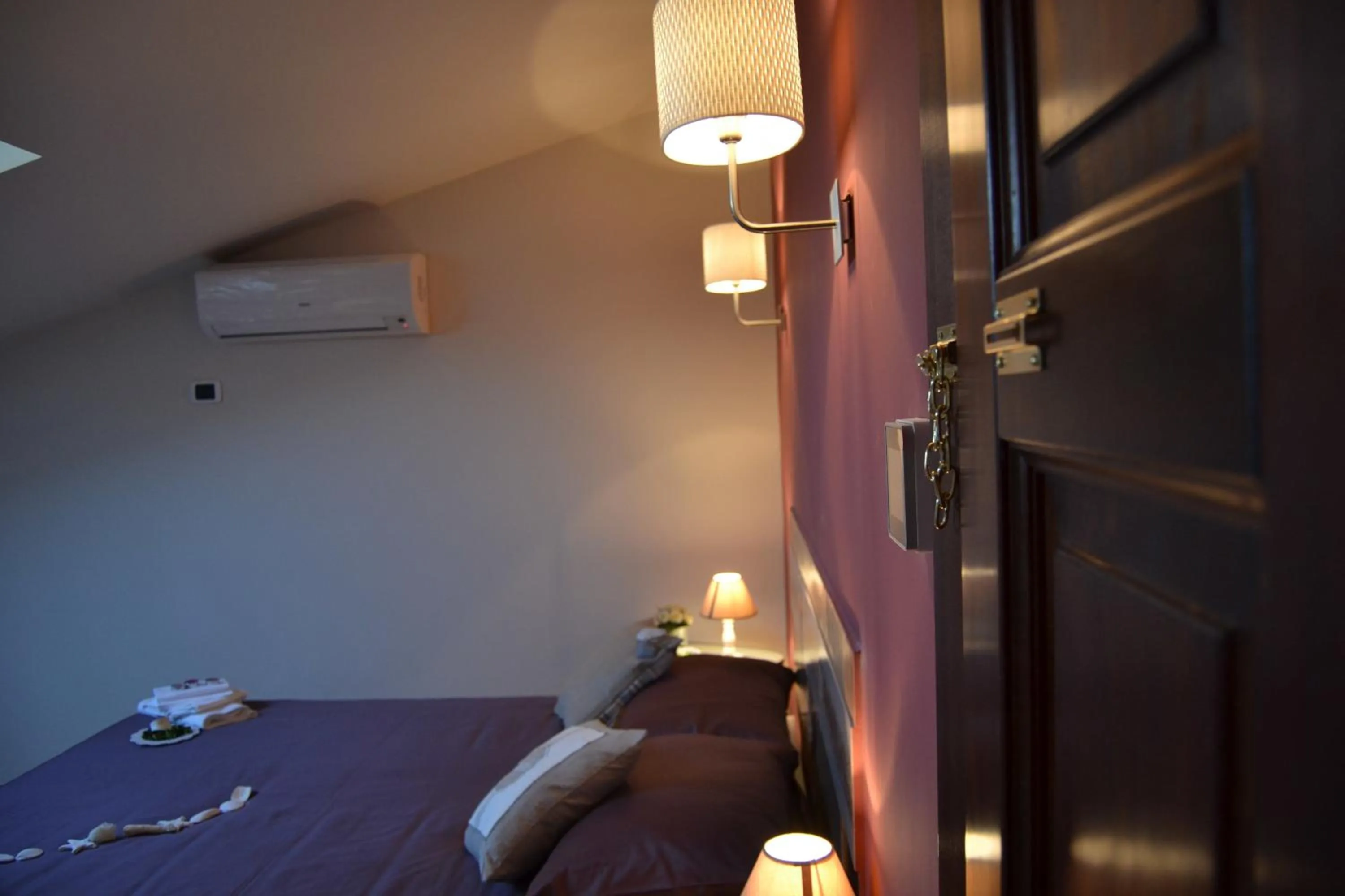 Photo of the whole room, Bed in Un Tetto Di Stelle Deluxe Home