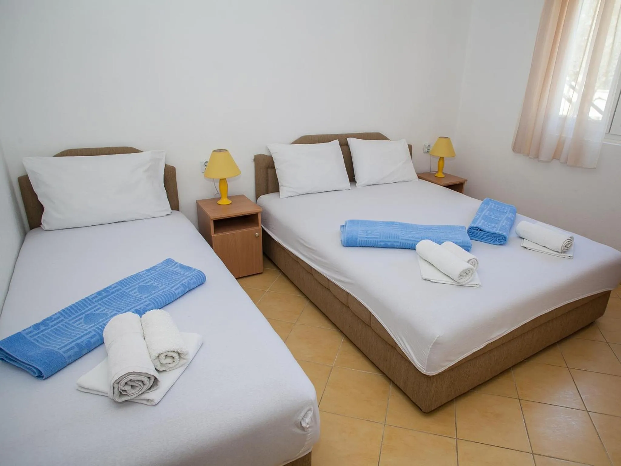 Bed in Daria Apartments